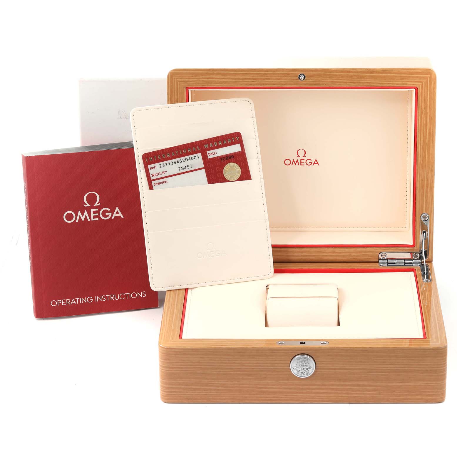 The image shows an Omega Aqua Terra 231.13.44.52.04.001 Men
s Stainless Steel White Dial 231.13.44.52.04.001 Men
s Stainless Steel White Dial watch box, operating instructions booklet, and the warranty card holder.
