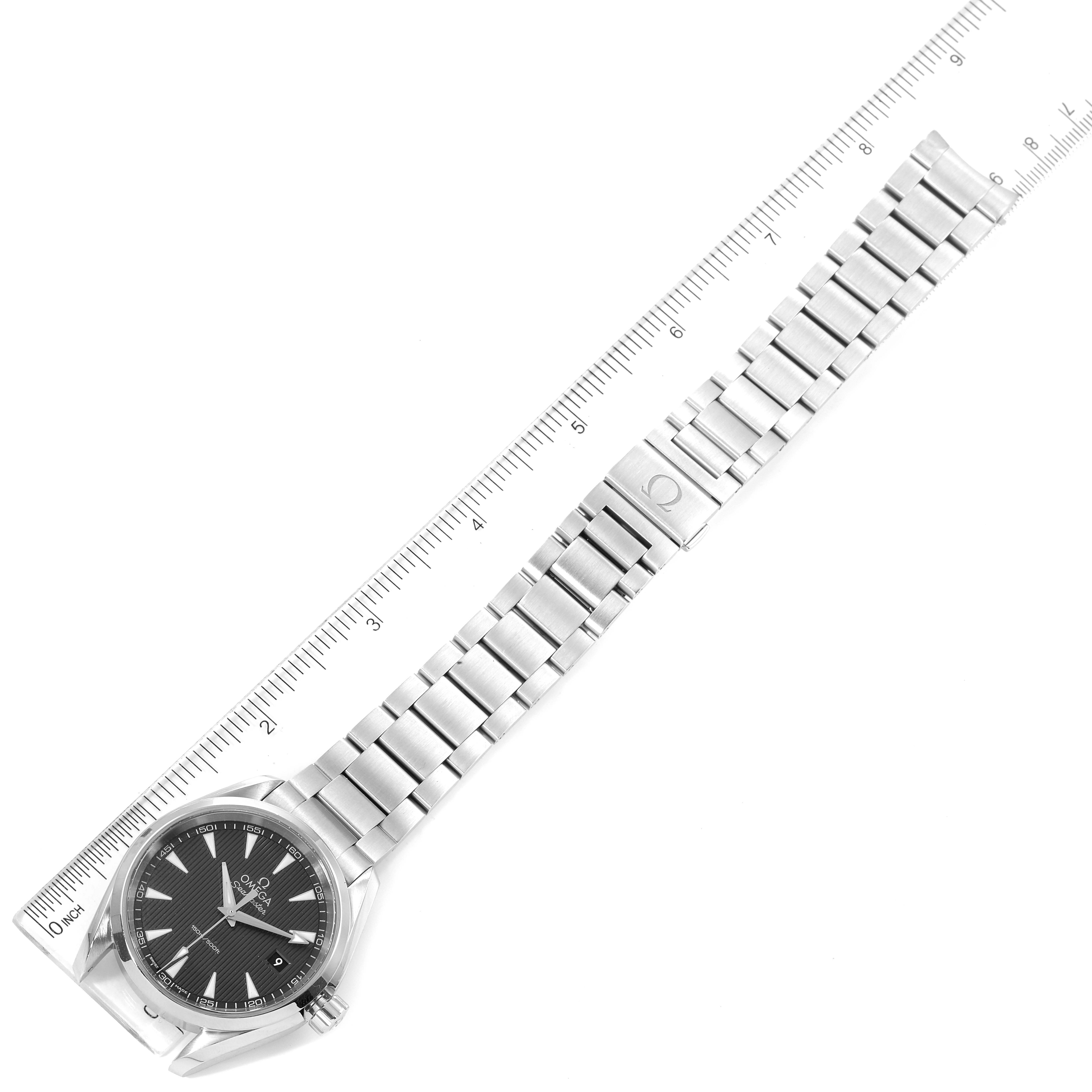 The Omega Aqua Terra 231.10.39.60.06.001 Men
s Stainless Steel Grey Dial 231.10.39.60.06.001 Men
s Stainless Steel Grey Dial watch is shown flat, displaying its face, bracelet, and deployment clasp alongside a ruler for scale.