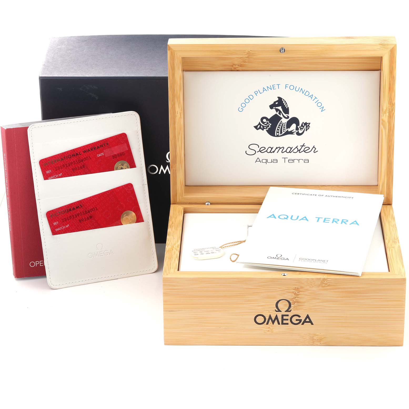 The image shows a wooden Omega Aqua Terra 231.92.39.21.04.001 Men's Titanium White Dial 231.92.39.21.04.001 Men's Titanium White Dial Seamaster box, warranty cards, and a manual at an angled top-down view.