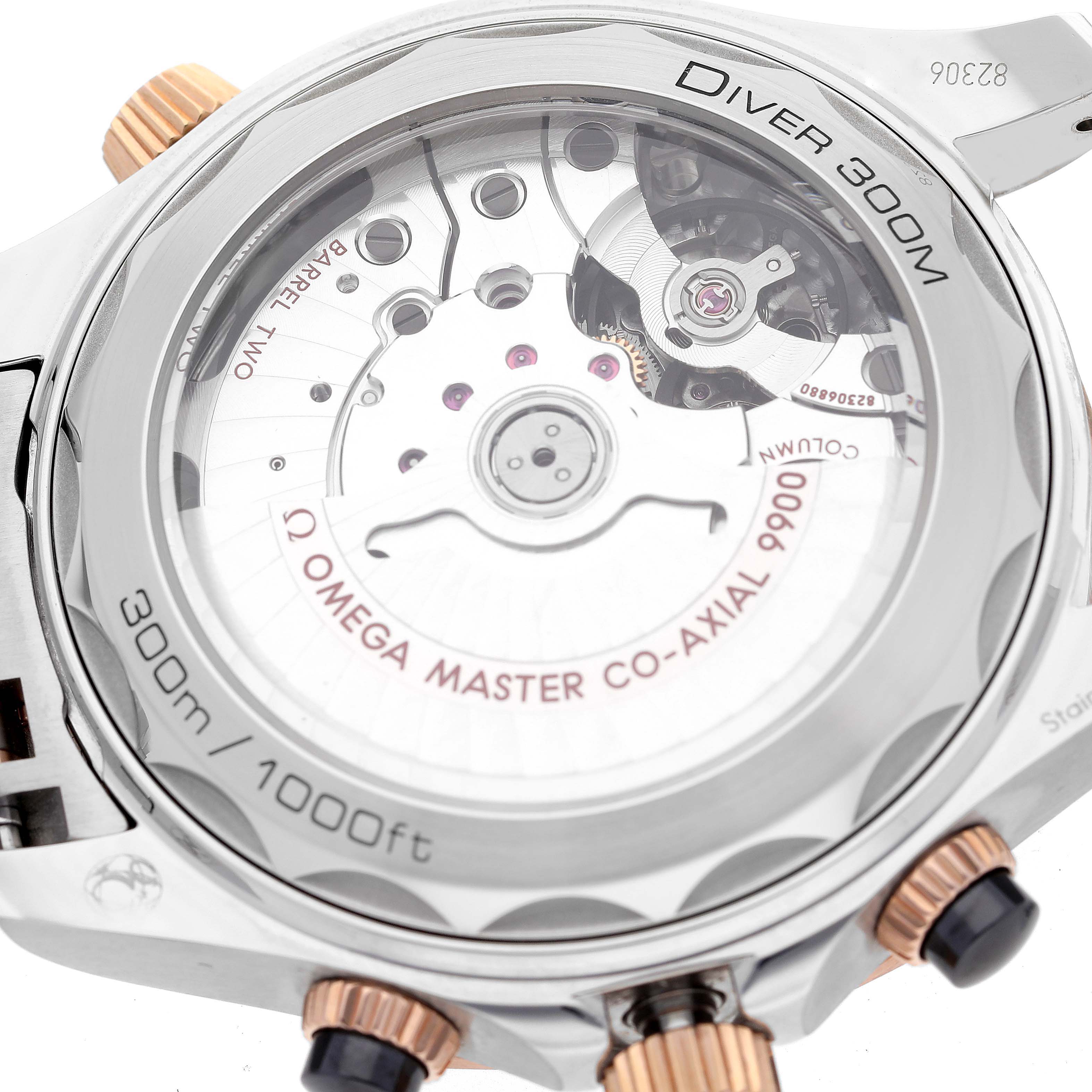 This image shows the back side of the Omega Seamaster 210.20.44.51.01.001 Men's Steel and Gold (two tone) Black Dial 210.20.44.51.01.001 Men's Steel and Gold (two tone) Black Dial Diver 300M, highlighting the transparent case back revealing the co-axial movement mechanism.