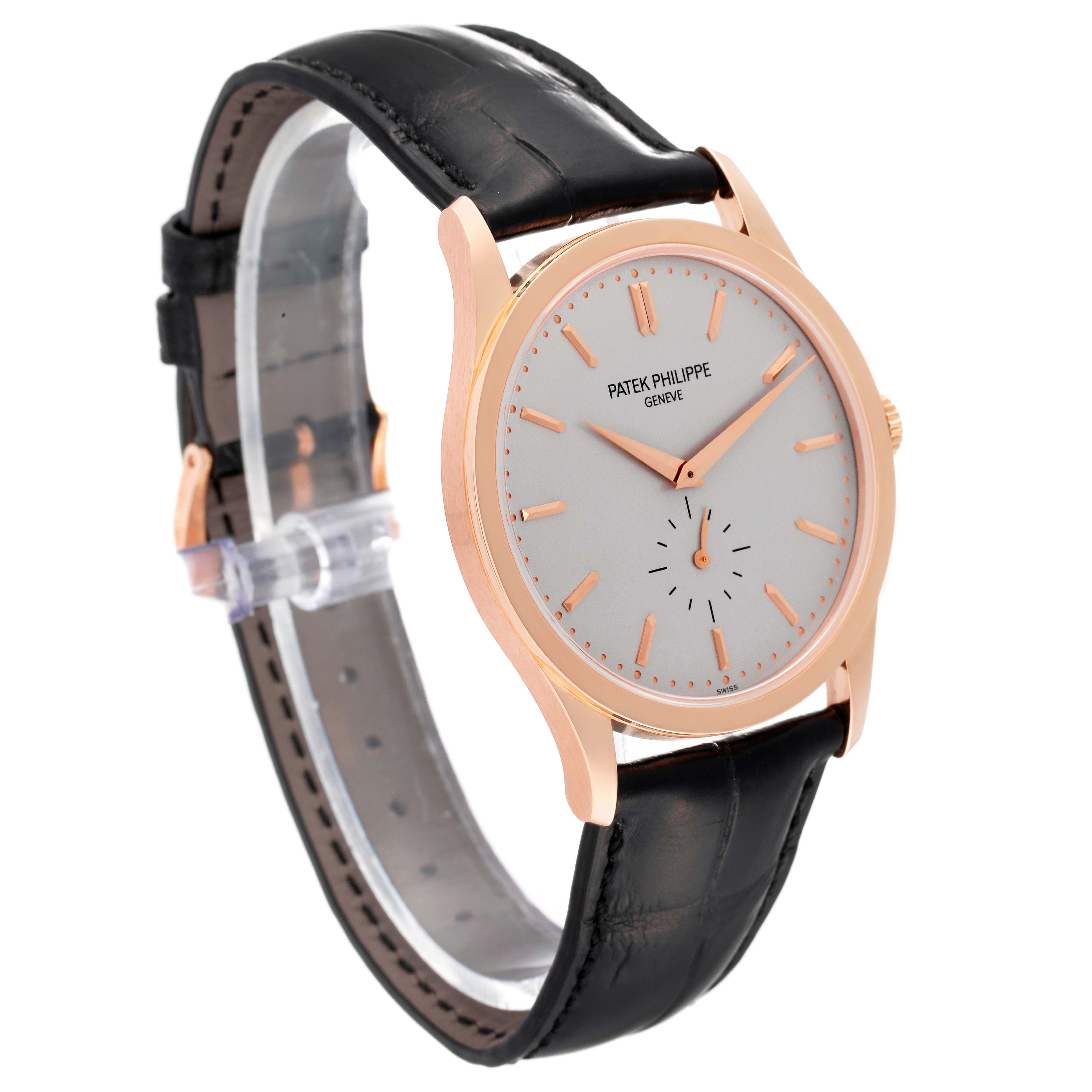 This image shows a side angle of the Patek Philippe Calatrava 5196R-001 Men's Rose Gold Silver Dial 5196R-001 Men's Rose Gold Silver Dial watch, highlighting its face, case, strap, and crown.