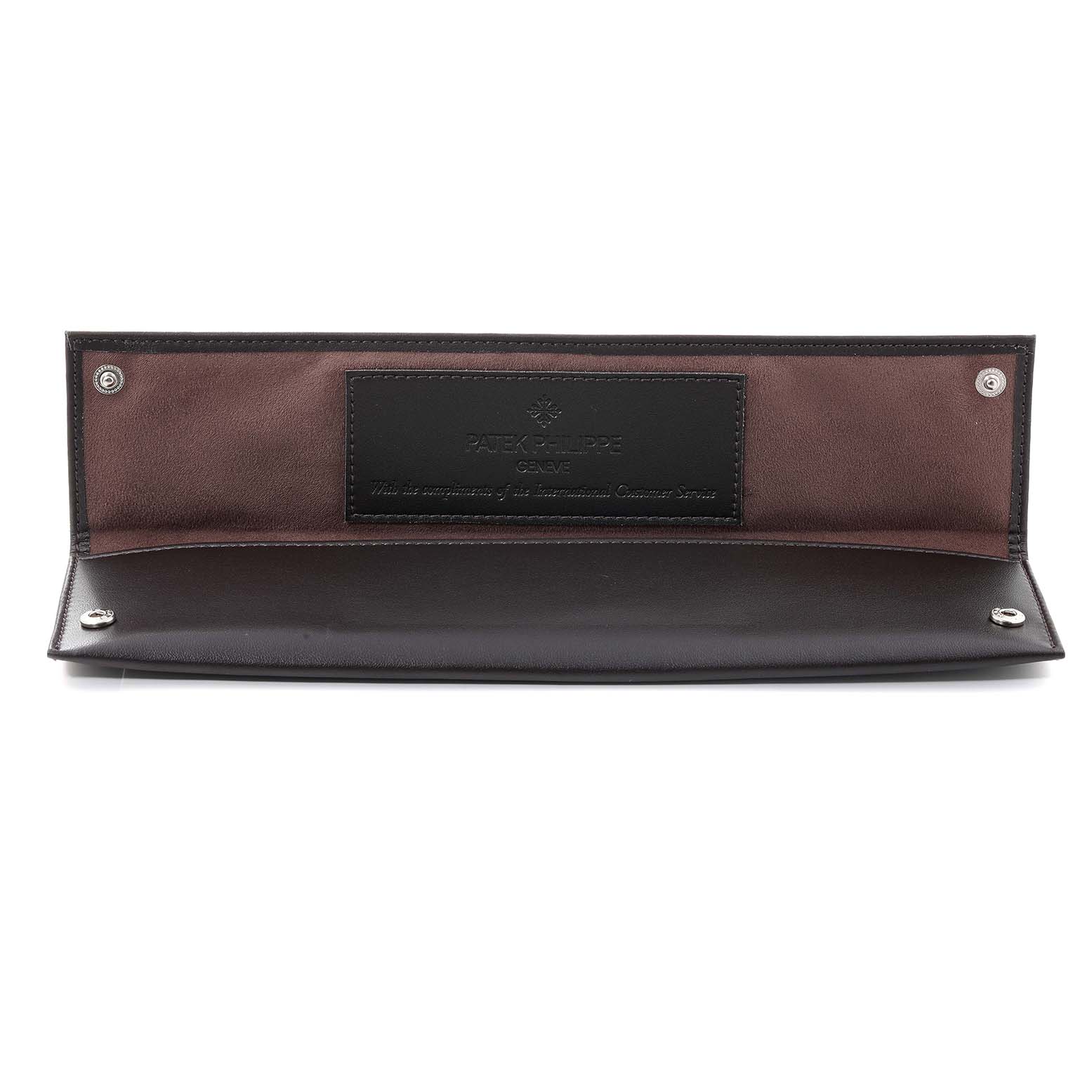 This image shows a Patek Philippe Calatrava 5196R-001 Men's Rose Gold Silver Dial 5196R-001 Men's Rose Gold Silver Dial watch sleeve from a top-down angle.