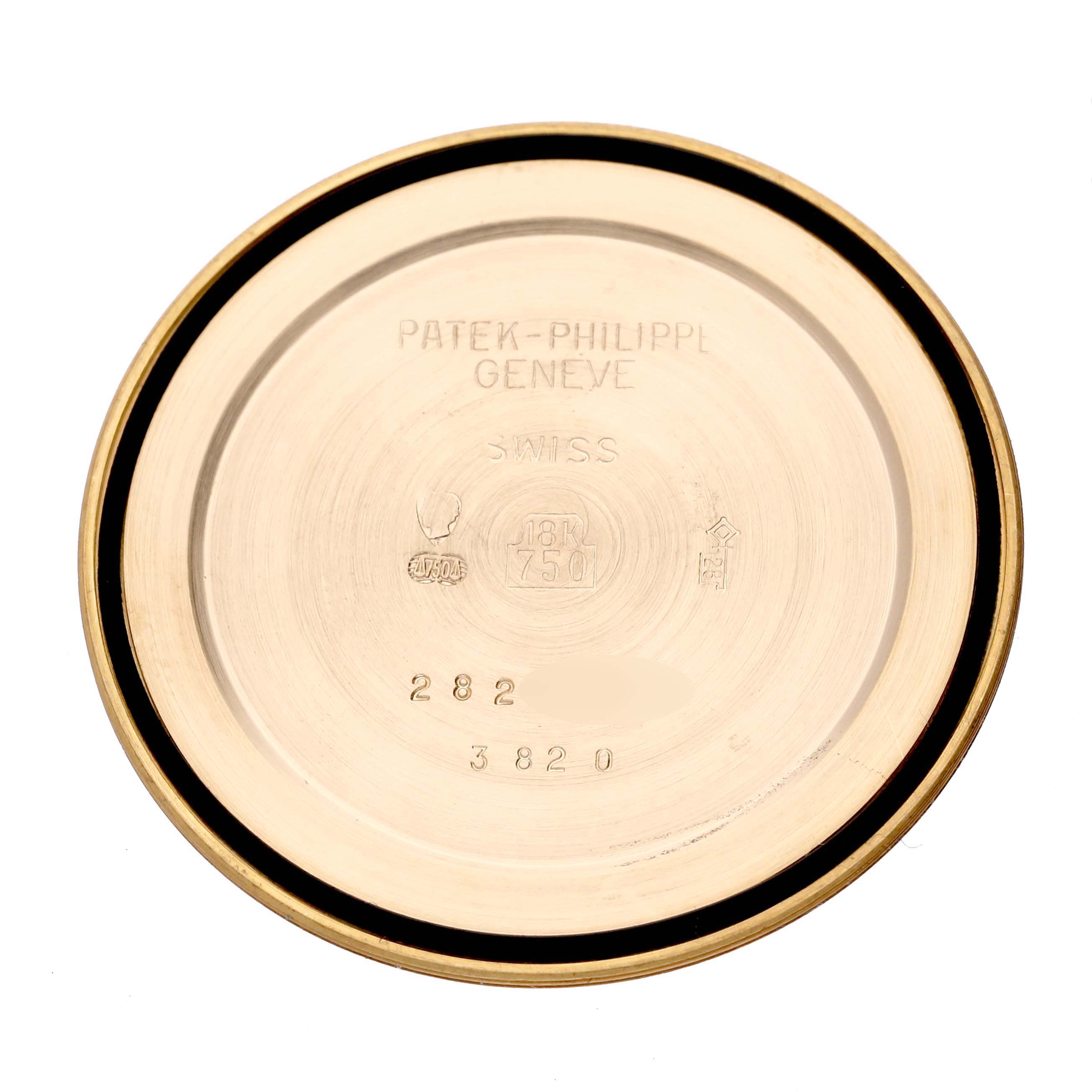 The image shows the inside case back of a Patek Philippe Calatrava Men's Yellow Gold Silver Dial Men's Yellow Gold Silver Dial watch.