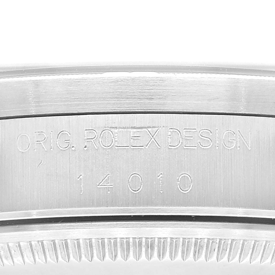 This image shows an engraved close-up view of the side casing of a Rolex Air-King 14010 Men's Stainless Steel Pink Dial 14010 Men's Stainless Steel Pink Dial watch, with the model number "14010".