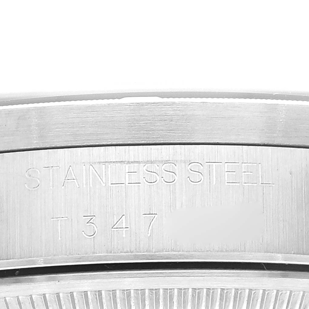 The image shows a close-up of the stainless steel caseback of a Rolex Air-King 14010 Men's Stainless Steel Pink Dial 14010 Men's Stainless Steel Pink Dial watch.