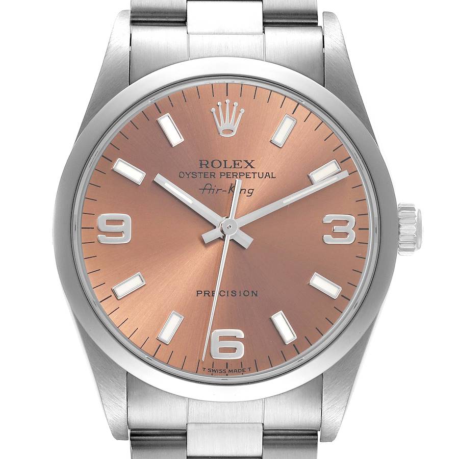 The Rolex Air-King is shown from a top-down angle, highlighting the dial, hands, and bracelet.