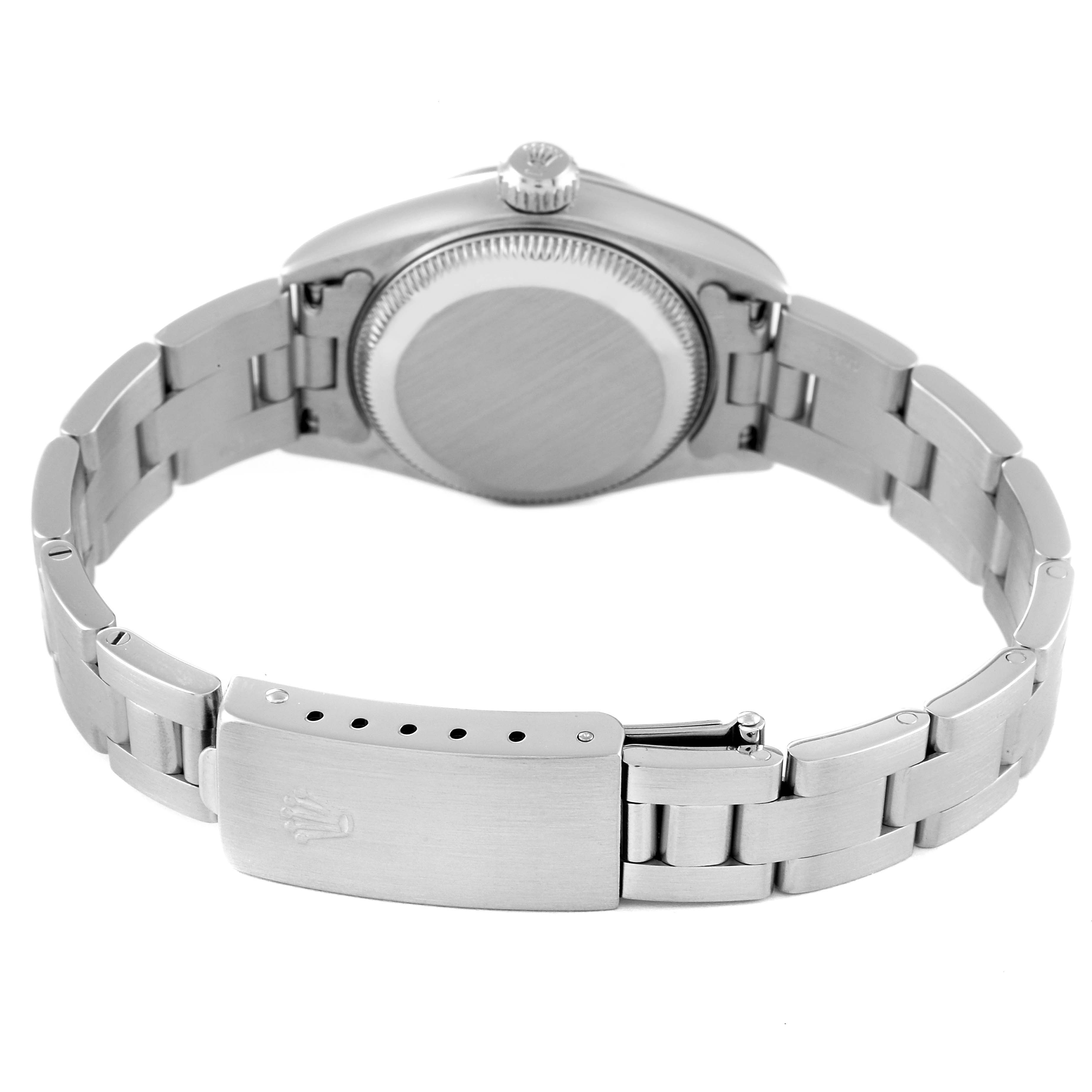 This image shows the backside and clasp of a Rolex Date 79160 Women's Stainless Steel White Dial 79160 Women's Stainless Steel White Dial model watch, highlighting its bracelet and case back.