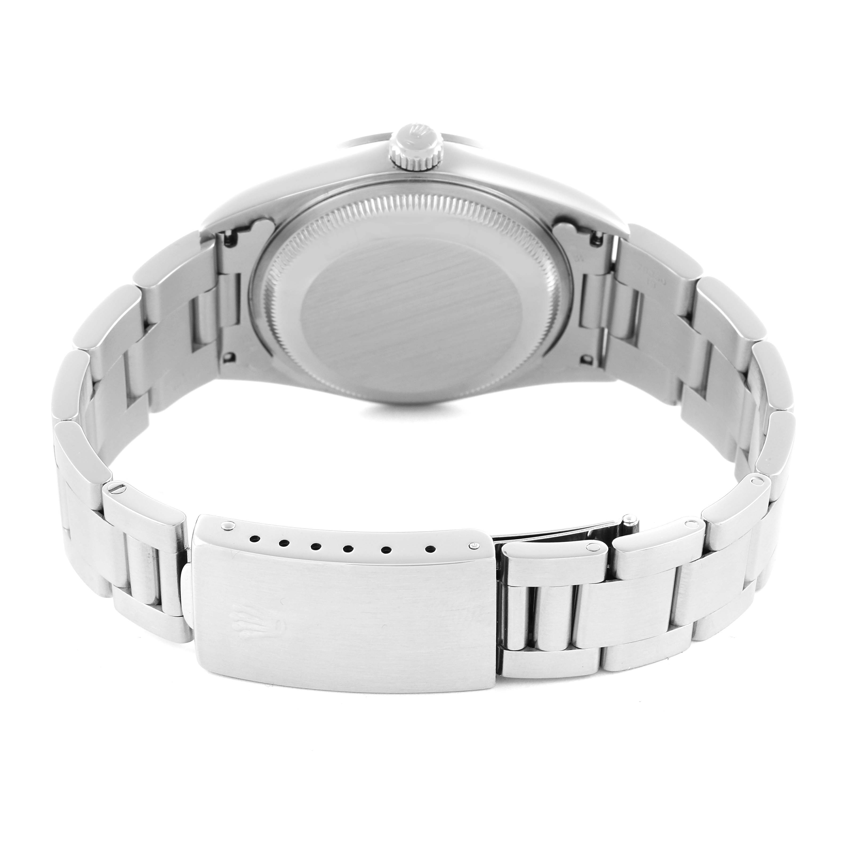 The image shows the back case and bracelet of the Rolex Air-King watch from a rear angle.