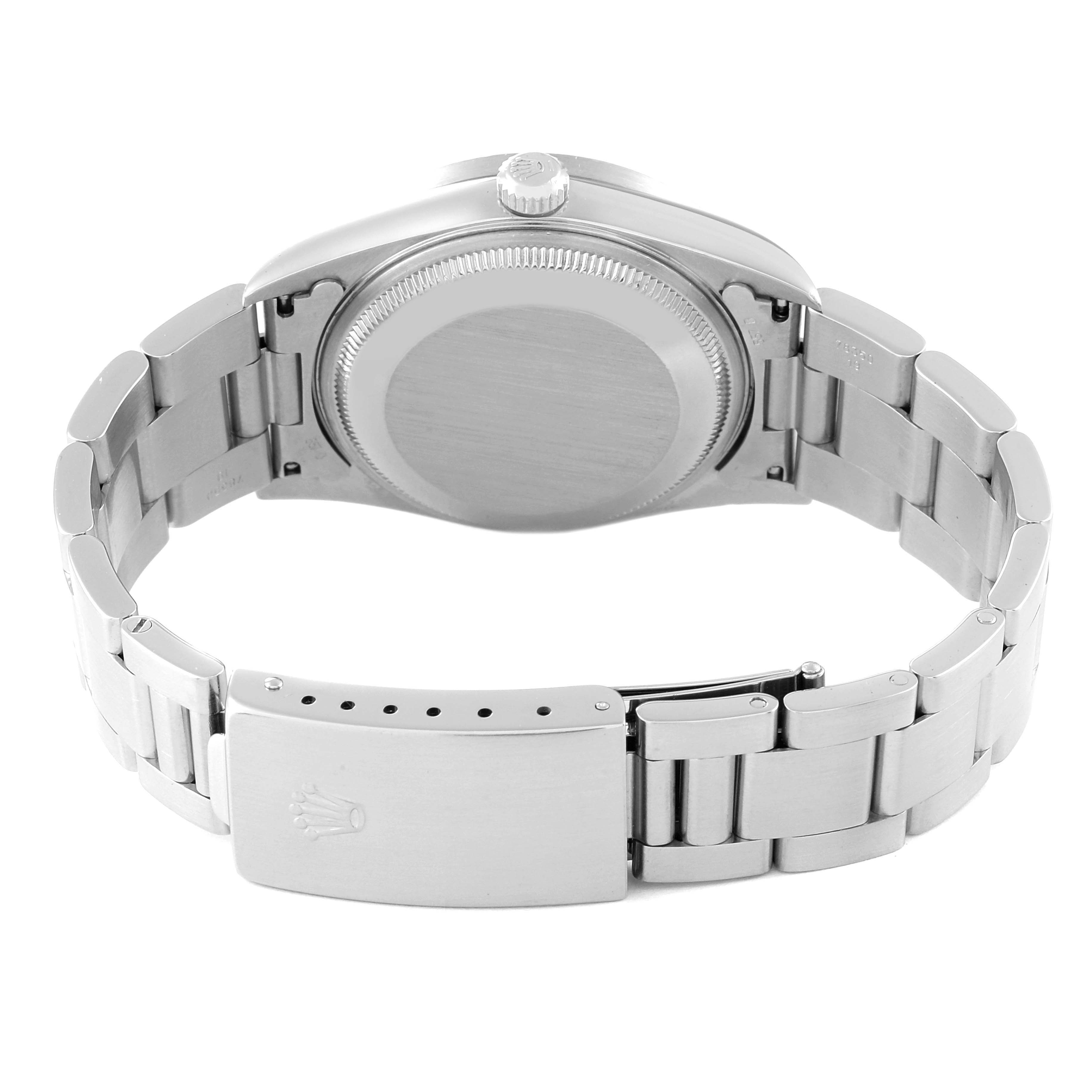 This image shows a rear view of the Rolex Air-King watch, highlighting its back case, crown, and metallic bracelet.