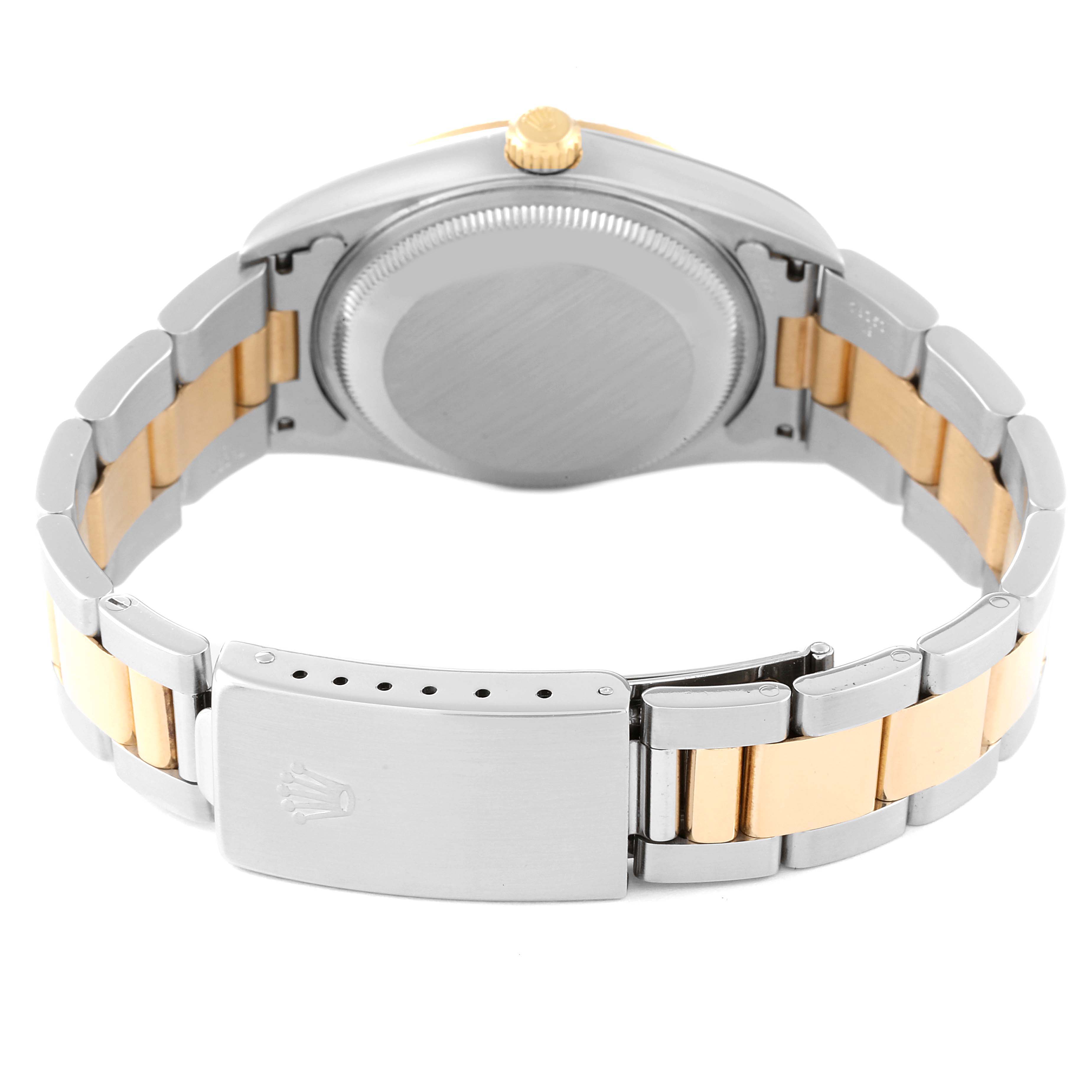 This image shows the back view of a Rolex Date 15223 Men
s Steel and Gold (two tone) Champagne Dial 15223 Men
s Steel and Gold (two tone) Champagne Dial model watch, highlighting the stainless steel and gold bracelet and clasp.