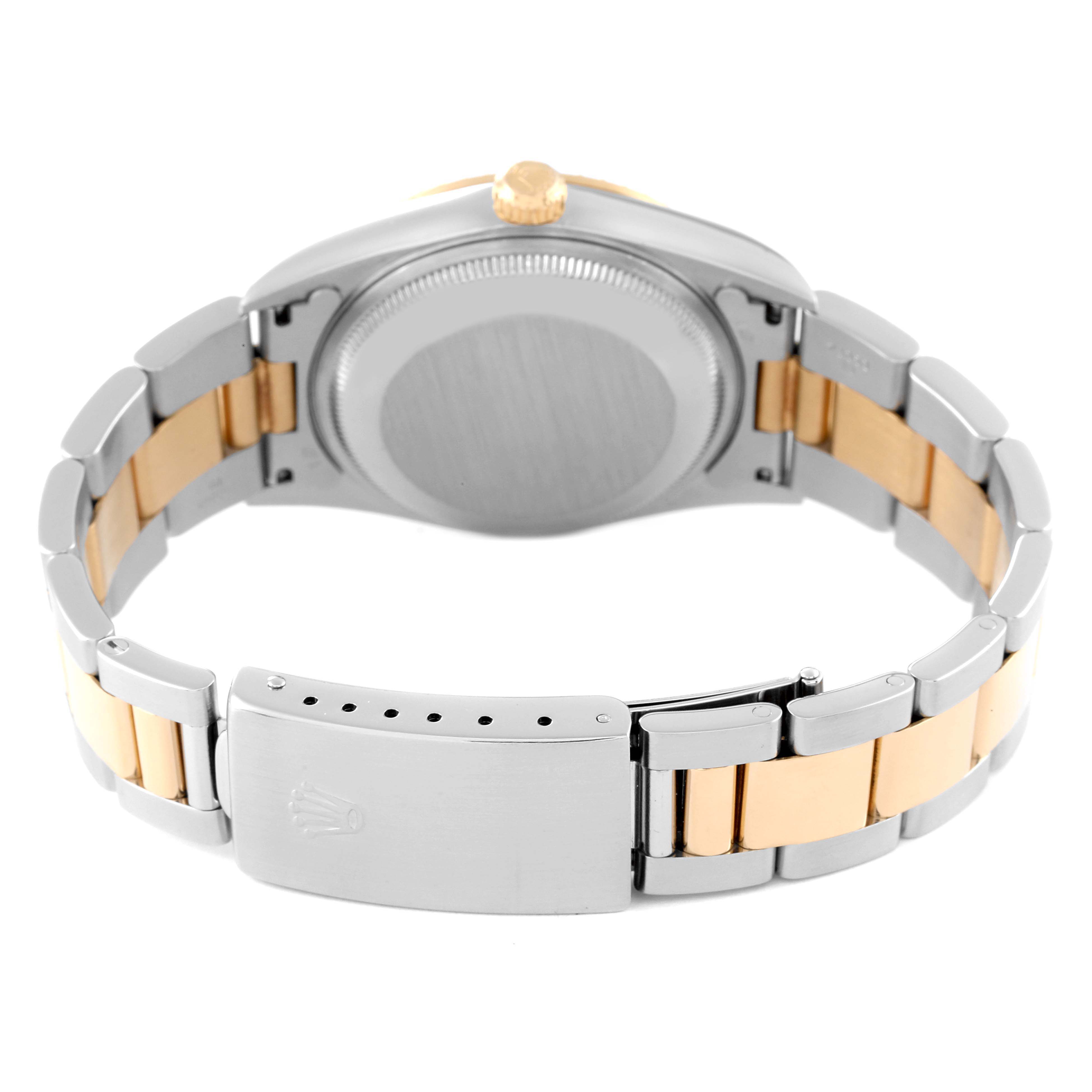 This image shows the back view of a Rolex Date 15223 Men
s Steel and Gold (two tone) Champagne Dial 15223 Men
s Steel and Gold (two tone) Champagne Dial model watch, displaying the caseback and bracelet with the clasp.