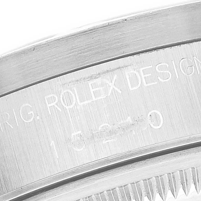 This image shows a close-up of the casing and engraved serial number of a Rolex Date 15210 Men
s Stainless Steel White Dial 15210 Men
s Stainless Steel White Dial model watch.