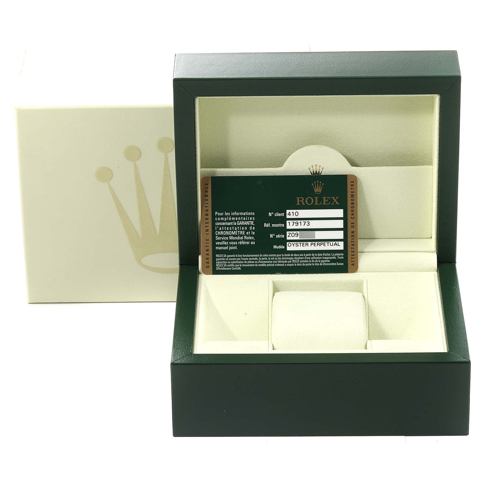 The image shows the open box for a Rolex Datejust 179173 Women's Steel and Gold (two tone) Silver Dial 179173 Women's Steel and Gold (two tone) Silver Dial watch, with a warranty card inside.