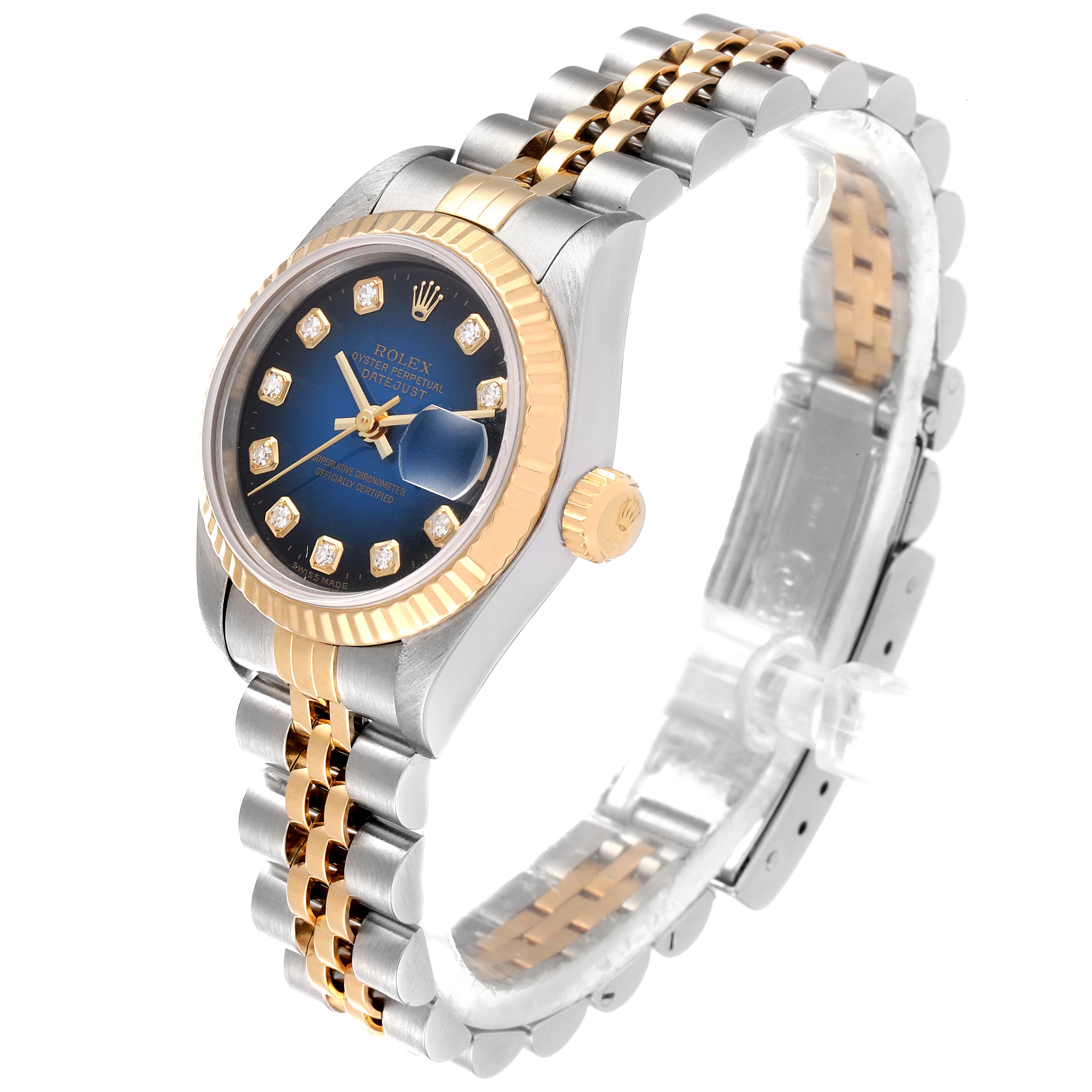 The image shows a Rolex Datejust 69173 Women's Steel and Gold (two tone) Blue Dial 69173 Women's Steel and Gold (two tone) Blue Dial watch with a blue dial, fluted bezel, and two-tone bracelet at an oblique angle.