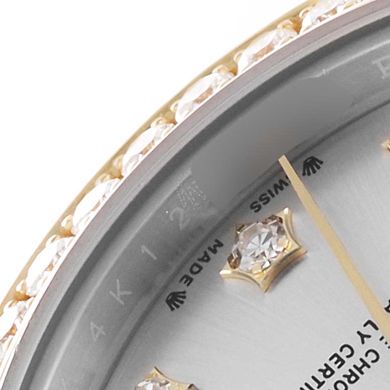This close-up image shows the bezel and part of the dial of a Rolex Datejust 279383 Women's Steel and Gold (two tone) Silver Dial 279383 Women's Steel and Gold (two tone) Silver Dial watch, featuring diamond markers.