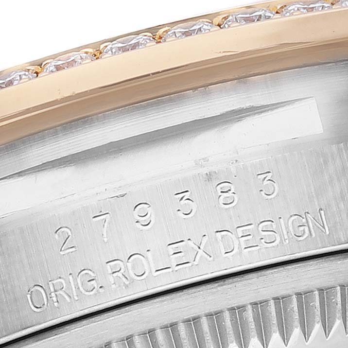 This close-up image shows the model number and part of the bezel and case of a Rolex Datejust 279383 Women's Steel and Gold (two tone) Silver Dial 279383 Women's Steel and Gold (two tone) Silver Dial watch.
