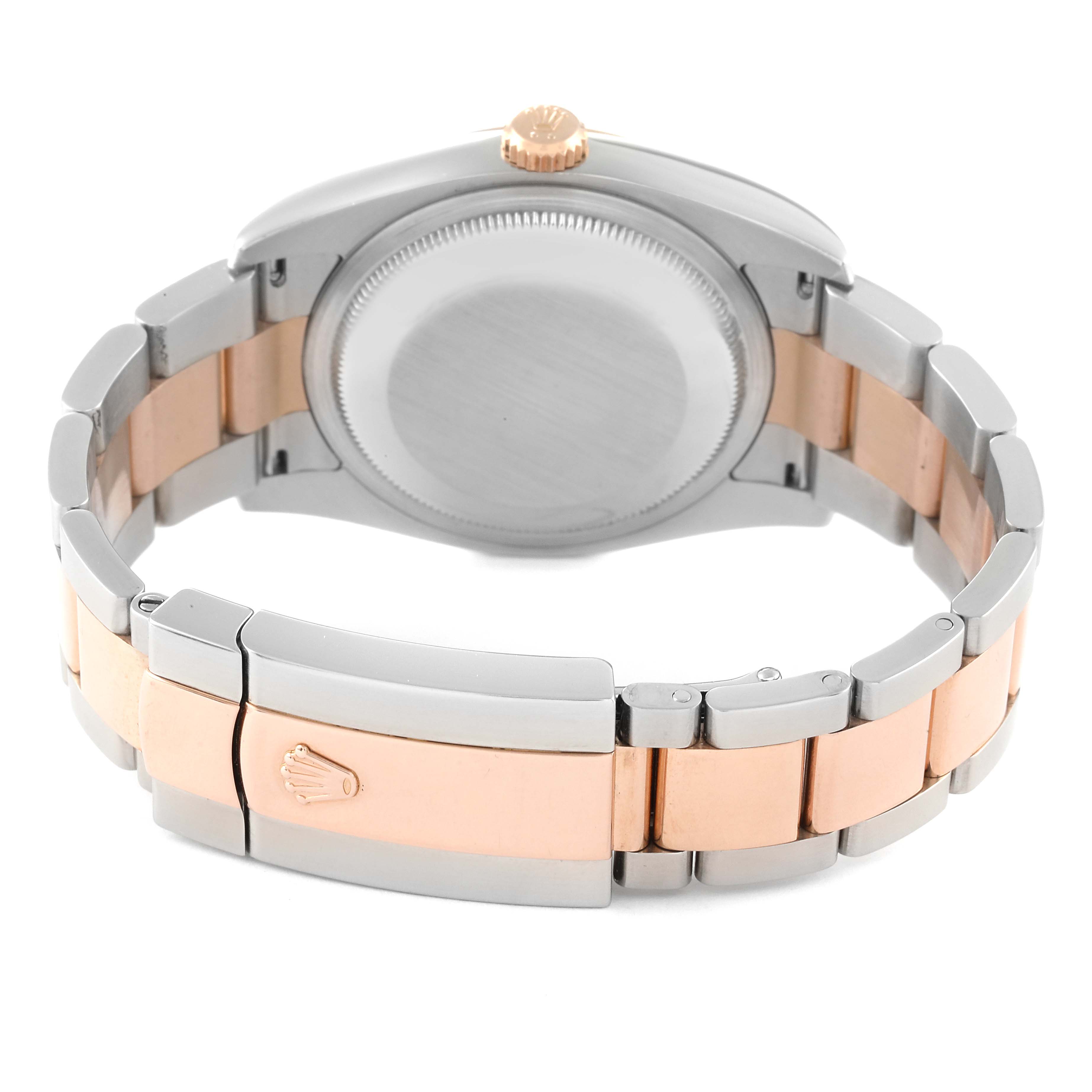 This Rolex Datejust 116201 Men's Steel and Gold (two tone) Silver Dial 116201 Men's Steel and Gold (two tone) Silver Dial watch is shown from the back, highlighting the case back and two-tone bracelet with clasp.