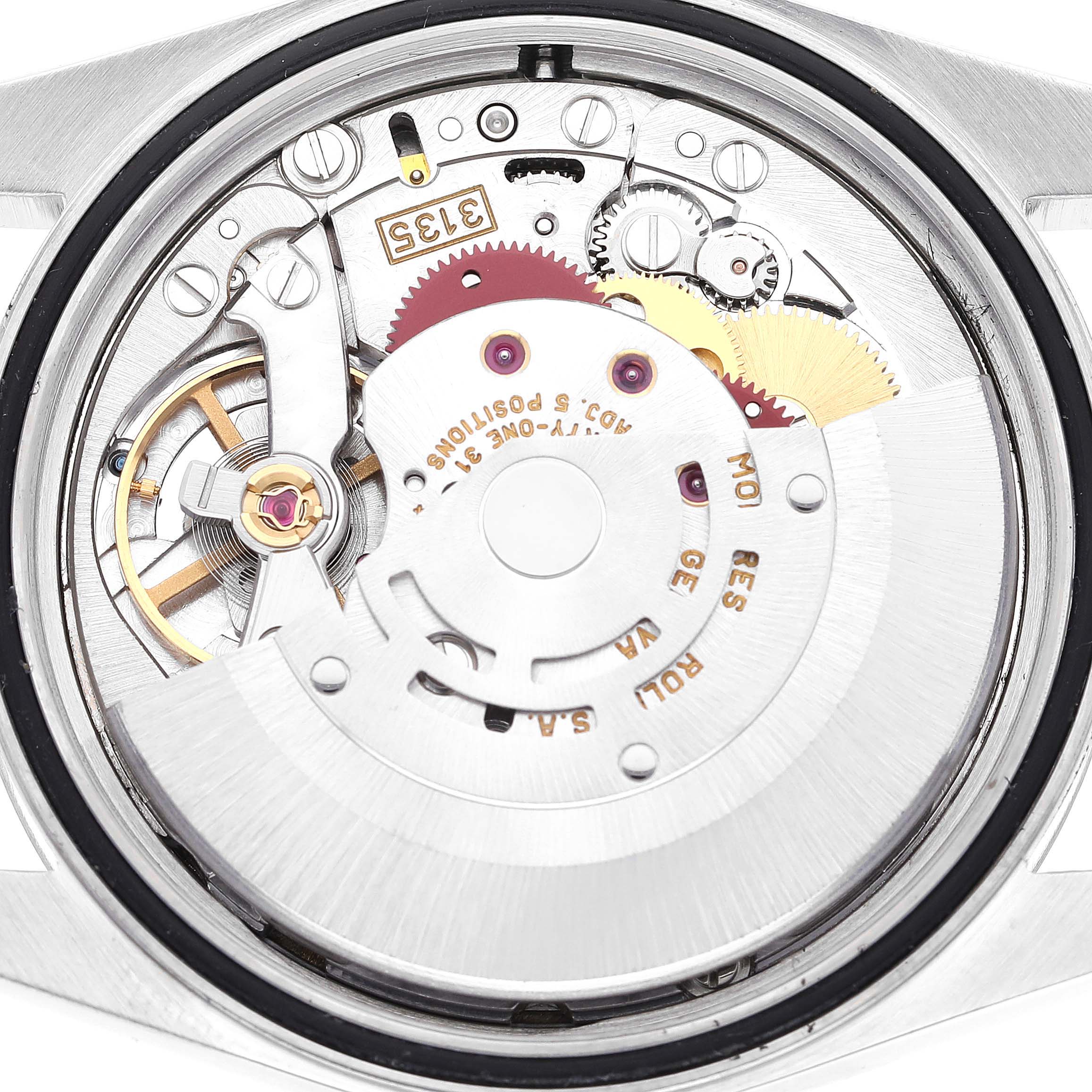 The image shows an inside view of the Rolex Datejust 16234 Men's Stainless Steel Pink Dial 16234 Men's Stainless Steel Pink Dial model's movement and internal mechanics from the back.
