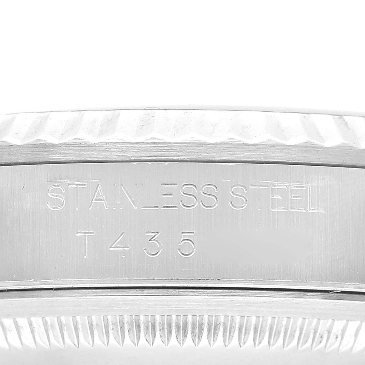 The image shows a close-up of the stainless steel bezel and side engraving of the Rolex Datejust 16234 Men's Stainless Steel Pink Dial 16234 Men's Stainless Steel Pink Dial watch.