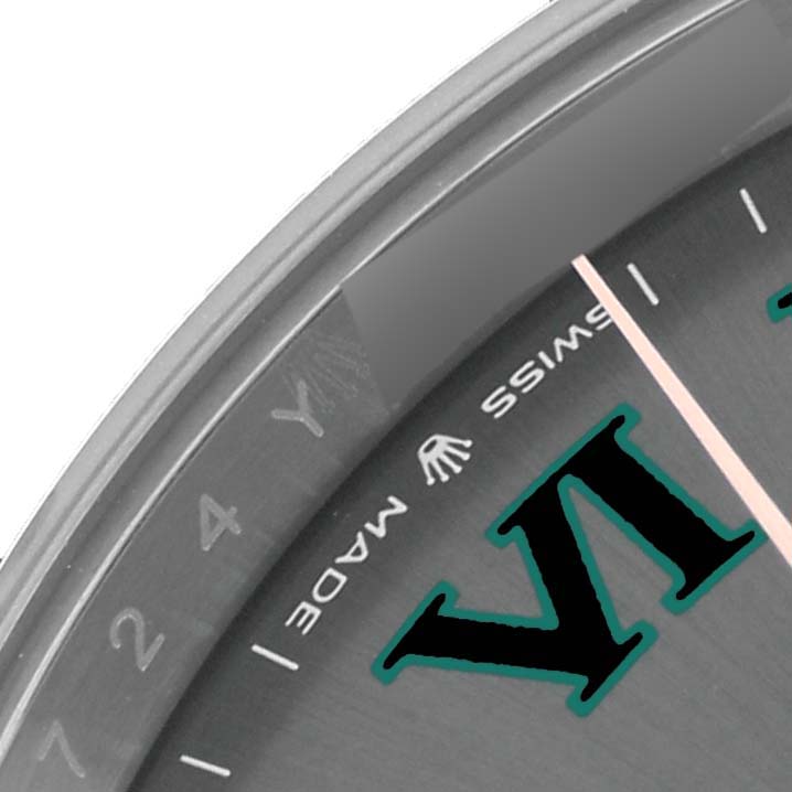 The image shows a close-up of the Rolex Datejust 41 126331 Men's Steel and Gold (two tone) Grey Dial 126331 Men's Steel and Gold (two tone) Grey Dial dial and bezel, featuring the Roman numeral VI and inscriptions.