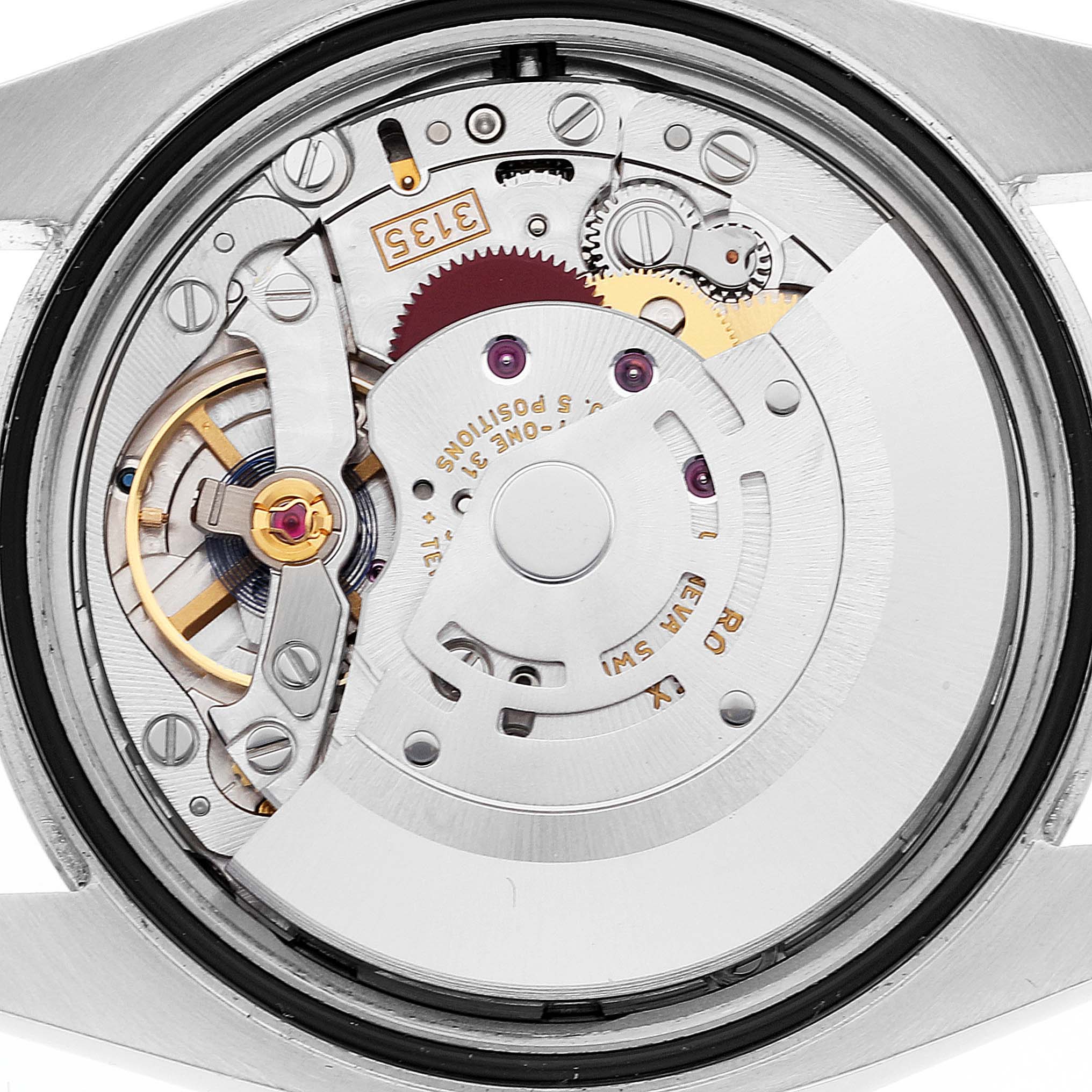 This image shows the internal mechanical movement of a Rolex Datejust 116200 Men's Stainless Steel Black Dial 116200 Men's Stainless Steel Black Dial watch, viewed from the back.