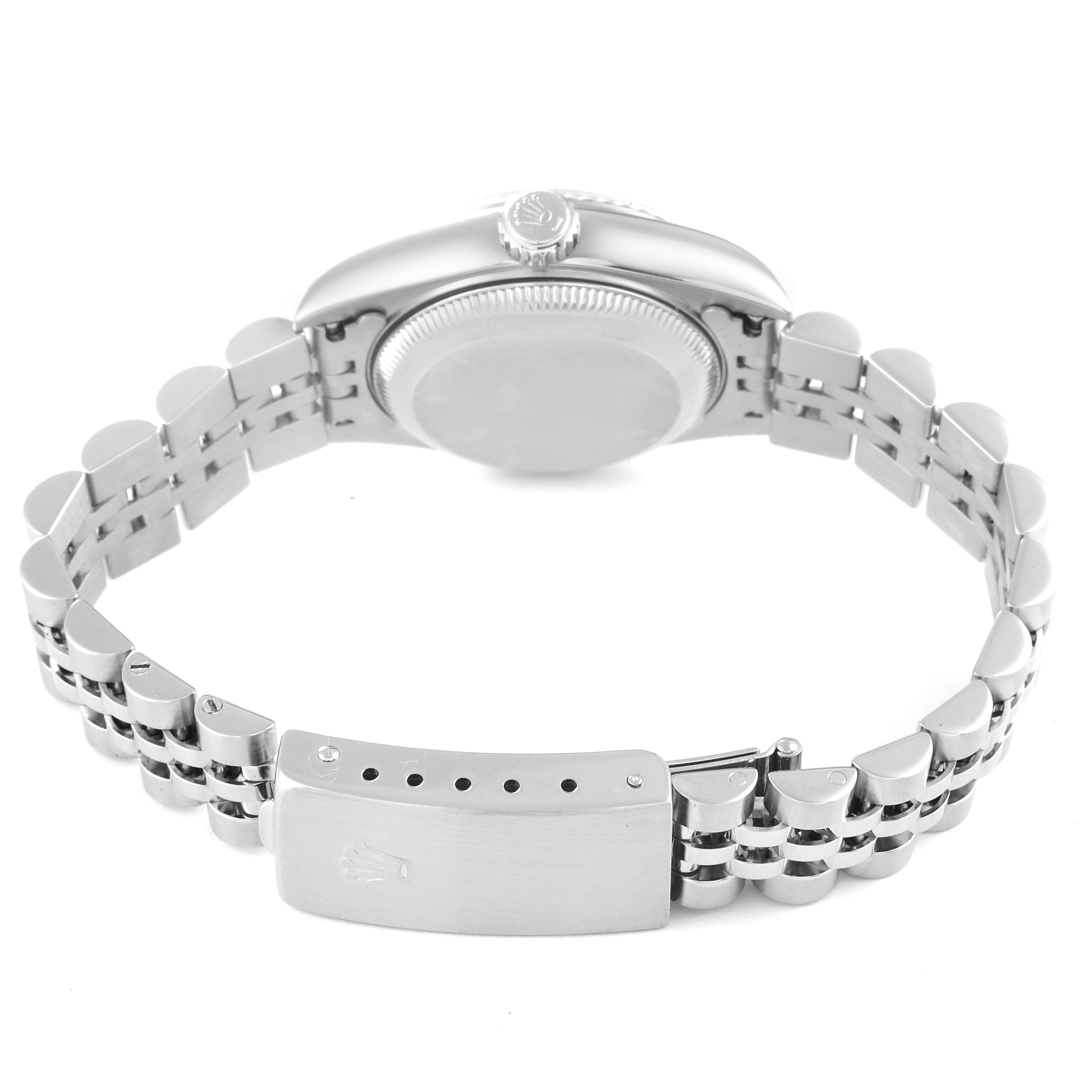 This image shows the Rolex Datejust 79174 Women's Stainless Steel Blue Dial 79174 Women's Stainless Steel Blue Dial watch from the side, highlighting the bracelet and clasp.