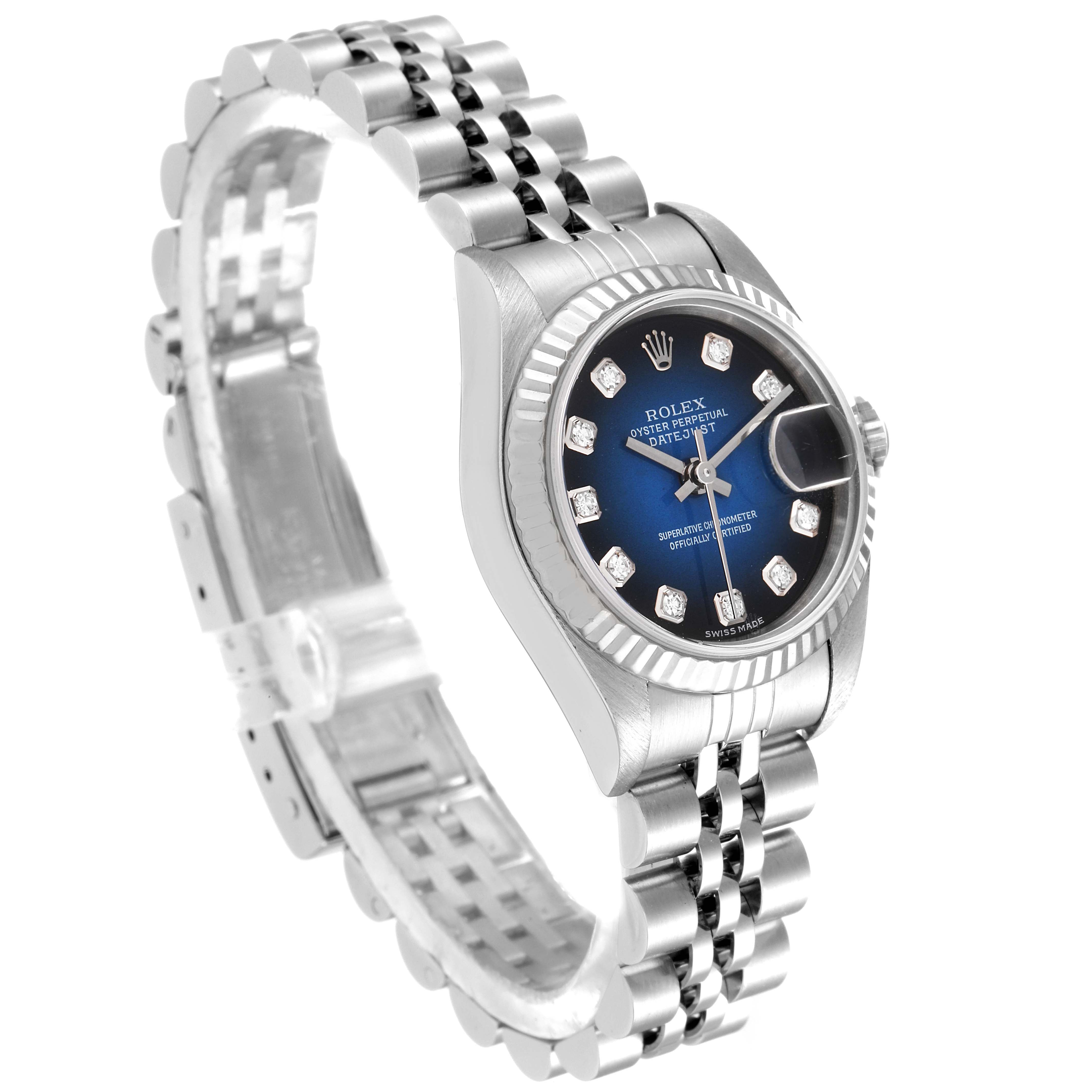 A Rolex Datejust 79174 Women's Stainless Steel Blue Dial 79174 Women's Stainless Steel Blue Dial watch shown at a slight angle, featuring its blue dial, fluted bezel, and Jubilee bracelet.