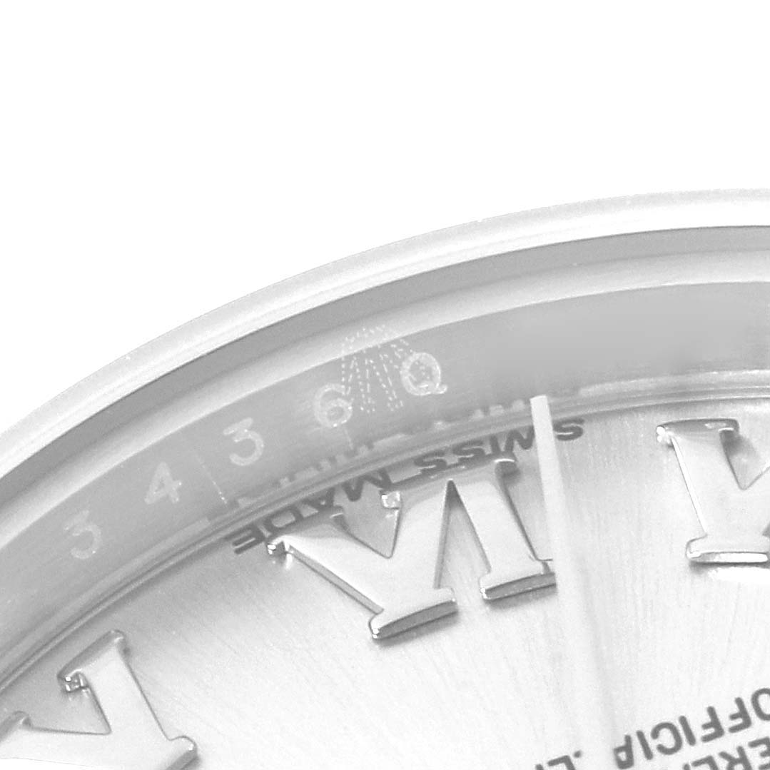This image shows a close-up angle of a Rolex Datejust 179160 Women's Stainless Steel Silver Dial 179160 Women's Stainless Steel Silver Dial's dial, featuring the Roman numeral markers and part of the minute track.