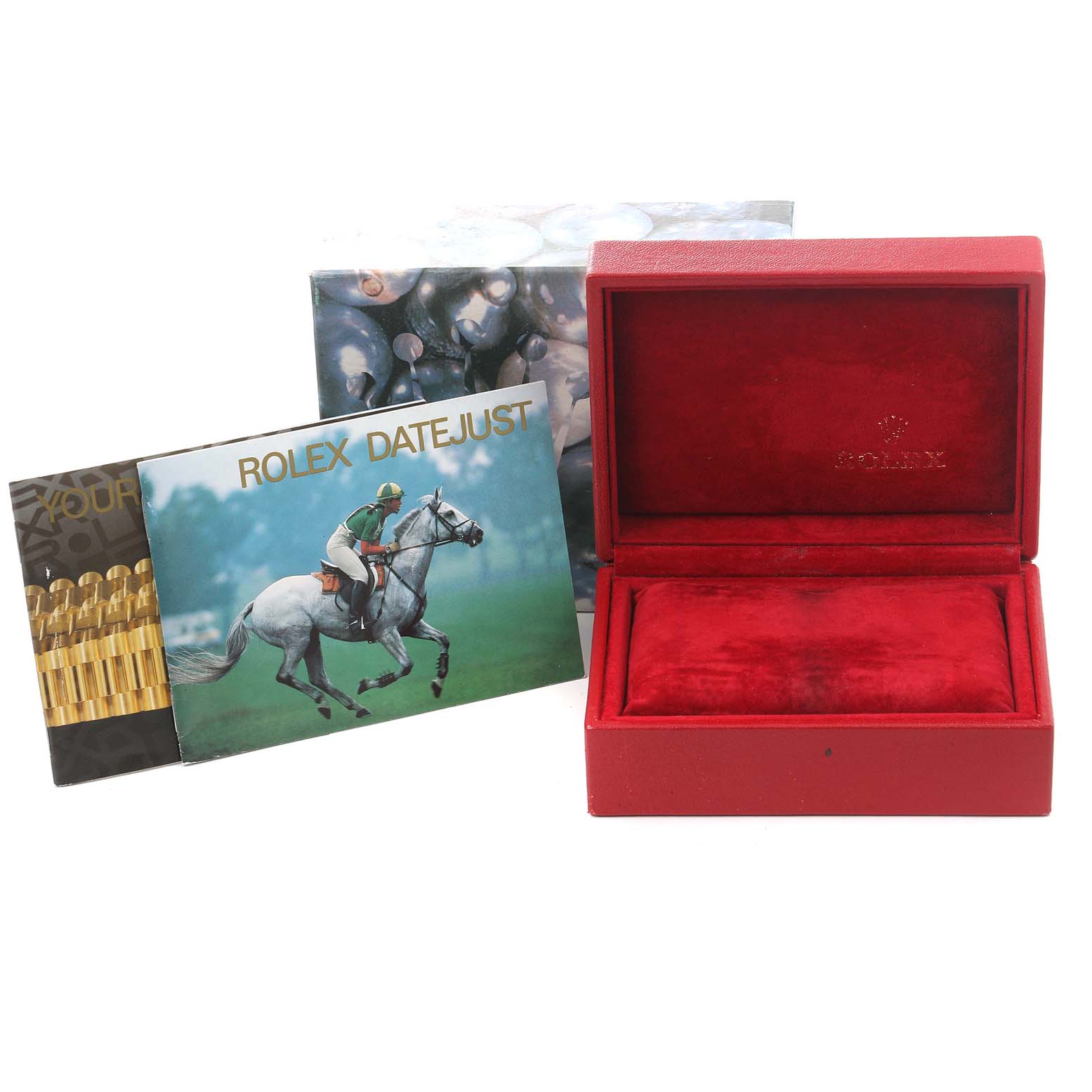 The image displays a Rolex Datejust 69174 Women's Stainless Steel Black Dial 69174 Women's Stainless Steel Black Dial watch box with brochures, viewed from the front.