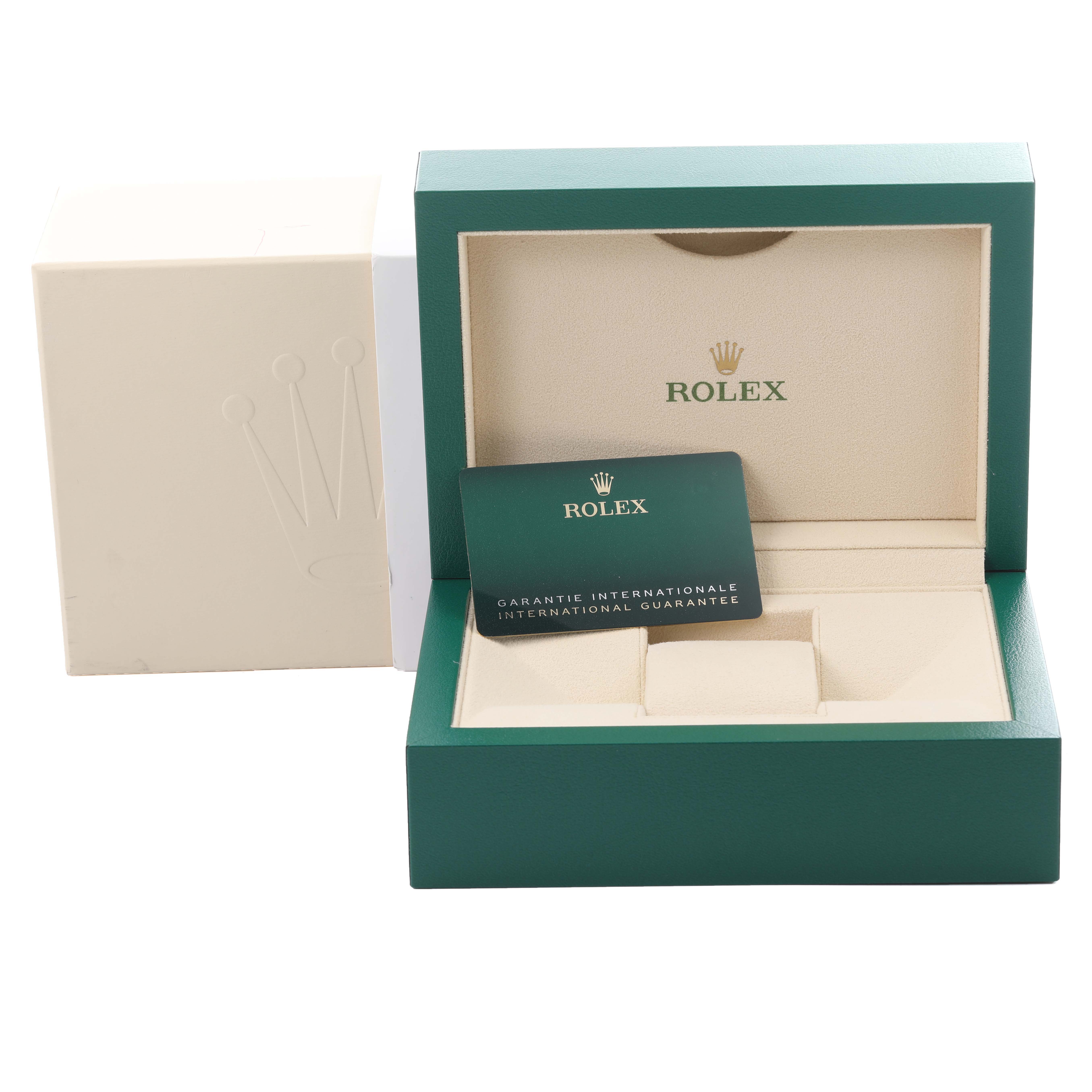 The image shows an open Rolex Mid-Size 278384 Women's Stainless Steel Blue Dial 278384 Women's Stainless Steel Blue Dial watch box with a warranty card inside.