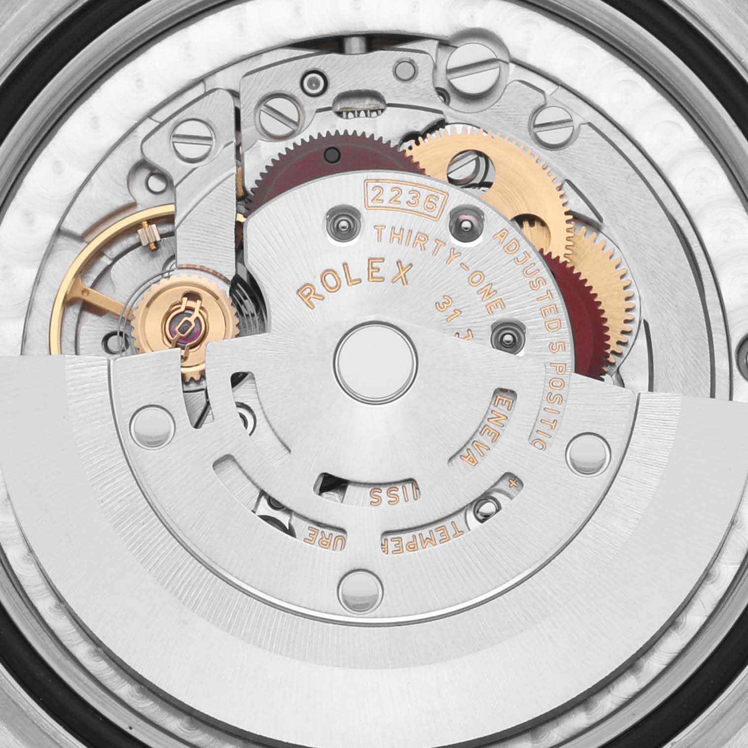 The image shows the internal mechanism of a Rolex Mid-Size 278384 Women's Stainless Steel Blue Dial 278384 Women's Stainless Steel Blue Dial watch, showcasing gears and the movement components.