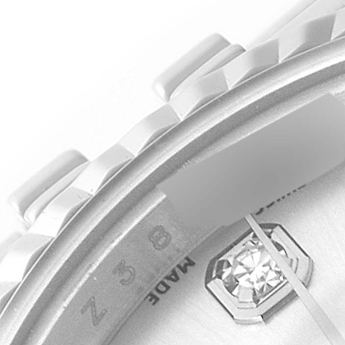 The image shows a close-up angle of the dial and fluted bezel of a Rolex Datejust 179174 Women's Stainless Steel Silver Dial 179174 Women's Stainless Steel Silver Dial watch.