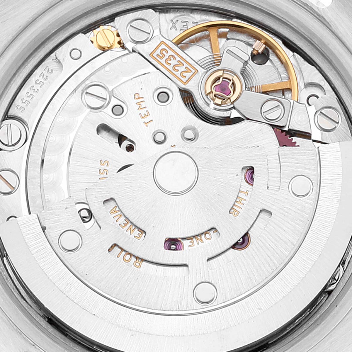 This image shows a close-up view of the movement inside a Rolex Datejust 179174 Women's Stainless Steel Silver Dial 179174 Women's Stainless Steel Silver Dial watch, revealing intricate gears and components.
