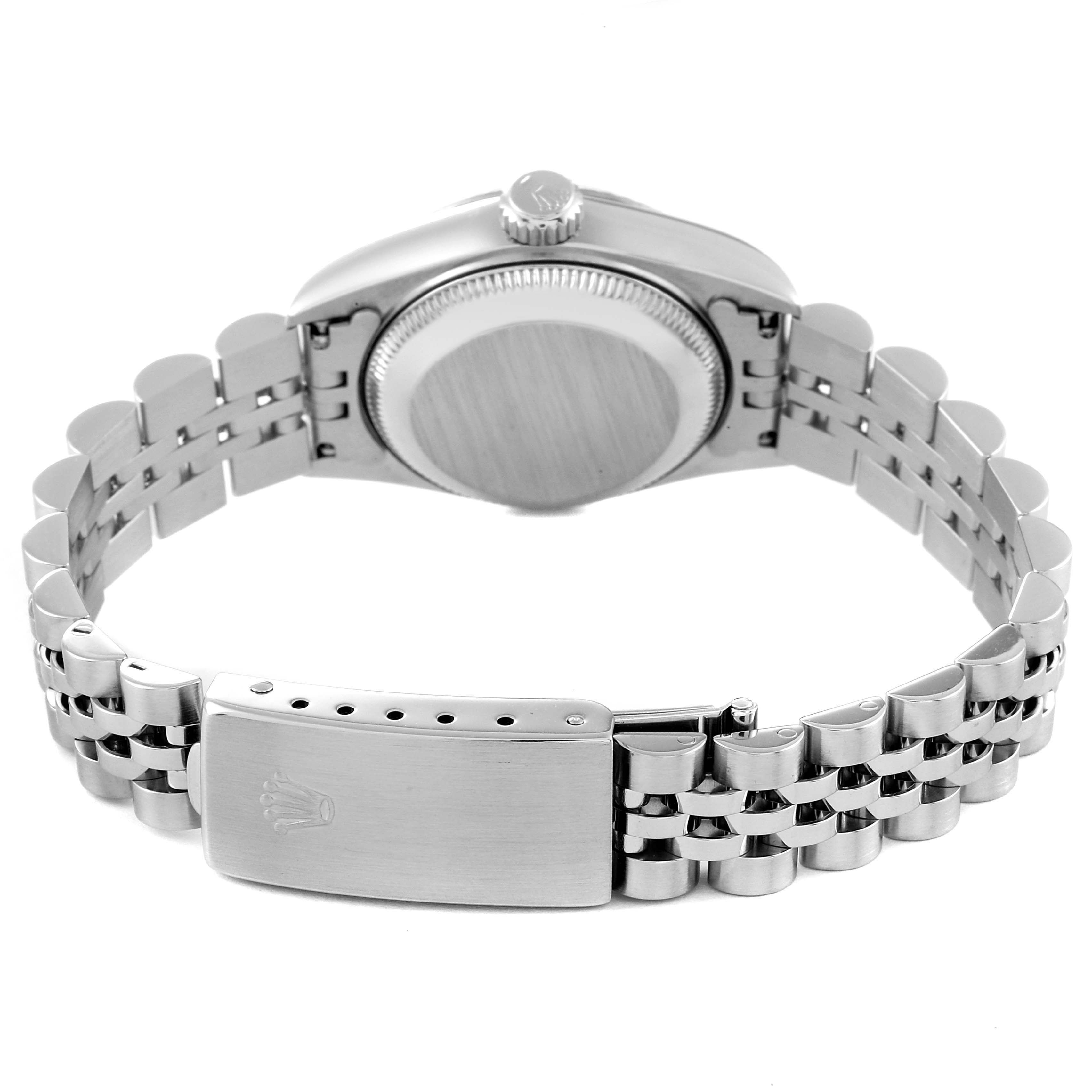 The Rolex Datejust 69174 Women's Stainless Steel Silver Dial 69174 Women's Stainless Steel Silver Dial watch is shown from the back, highlighting the case back, crown, and bracelet with the clasp.