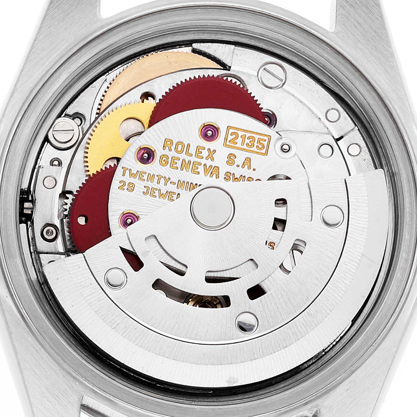 The image shows a close-up view of the Rolex Datejust 69174 Women's Stainless Steel Silver Dial 69174 Women's Stainless Steel Silver Dial movement, highlighting the internal gears and mechanisms.