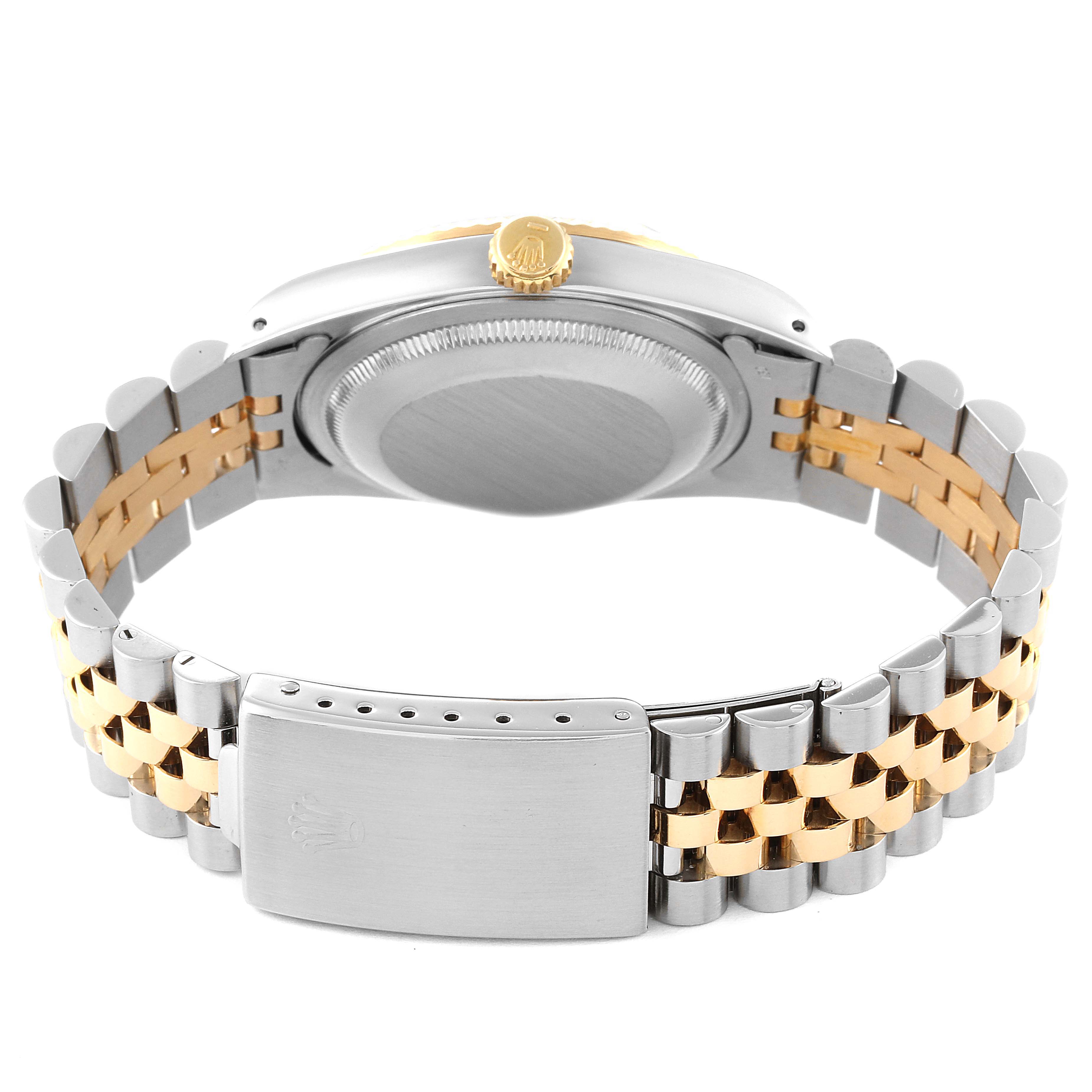 This image shows the back of a Rolex Datejust 16233 Men's Steel and Gold (two tone) Blue Dial 16233 Men's Steel and Gold (two tone) Blue Dial watch, focusing on the case back, crown, and two-tone bracelet.