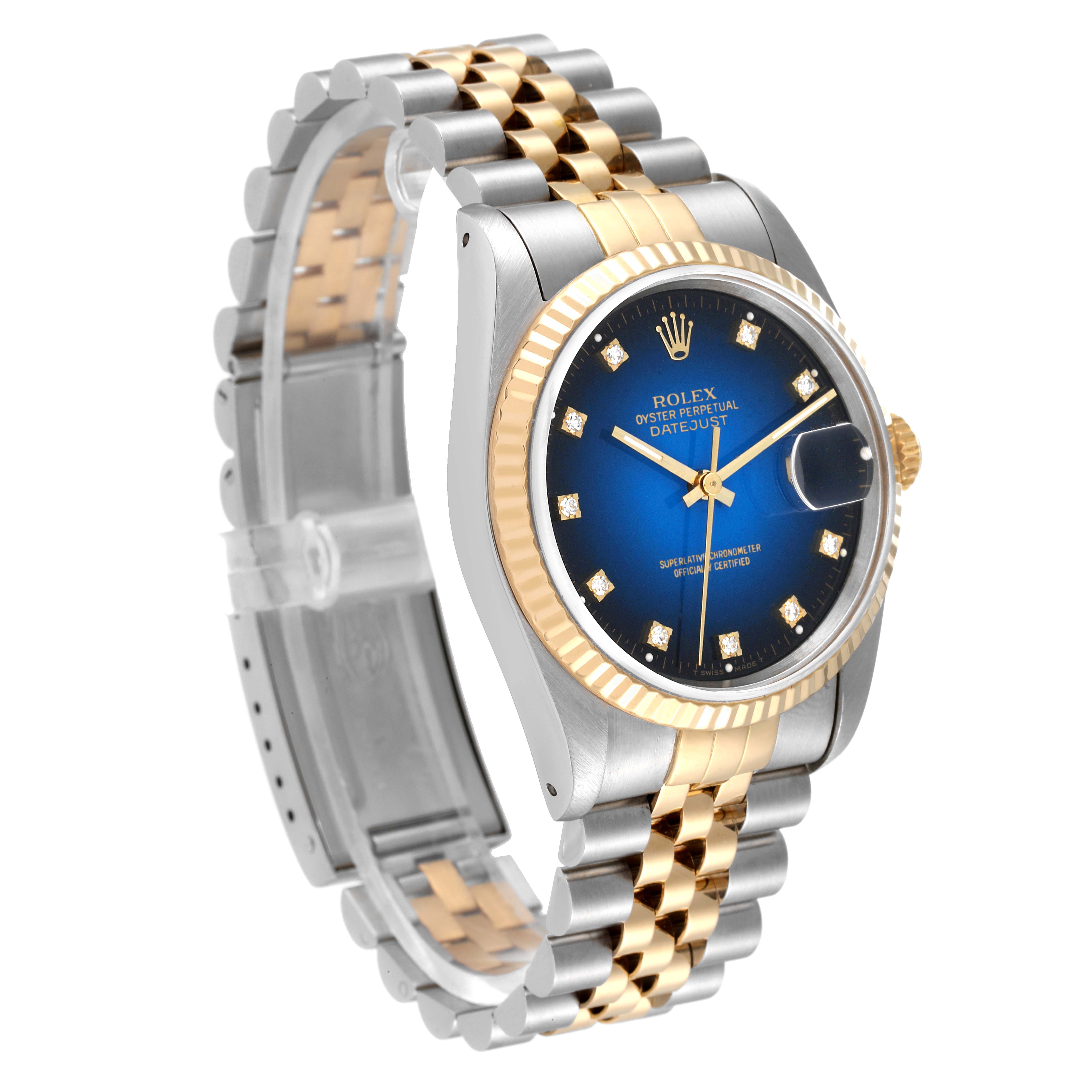 The image shows the Rolex Datejust 16233 Men's Steel and Gold (two tone) Blue Dial 16233 Men's Steel and Gold (two tone) Blue Dial watch at a 3/4 angle, featuring the blue dial, two-tone bracelet, and fluted bezel.
