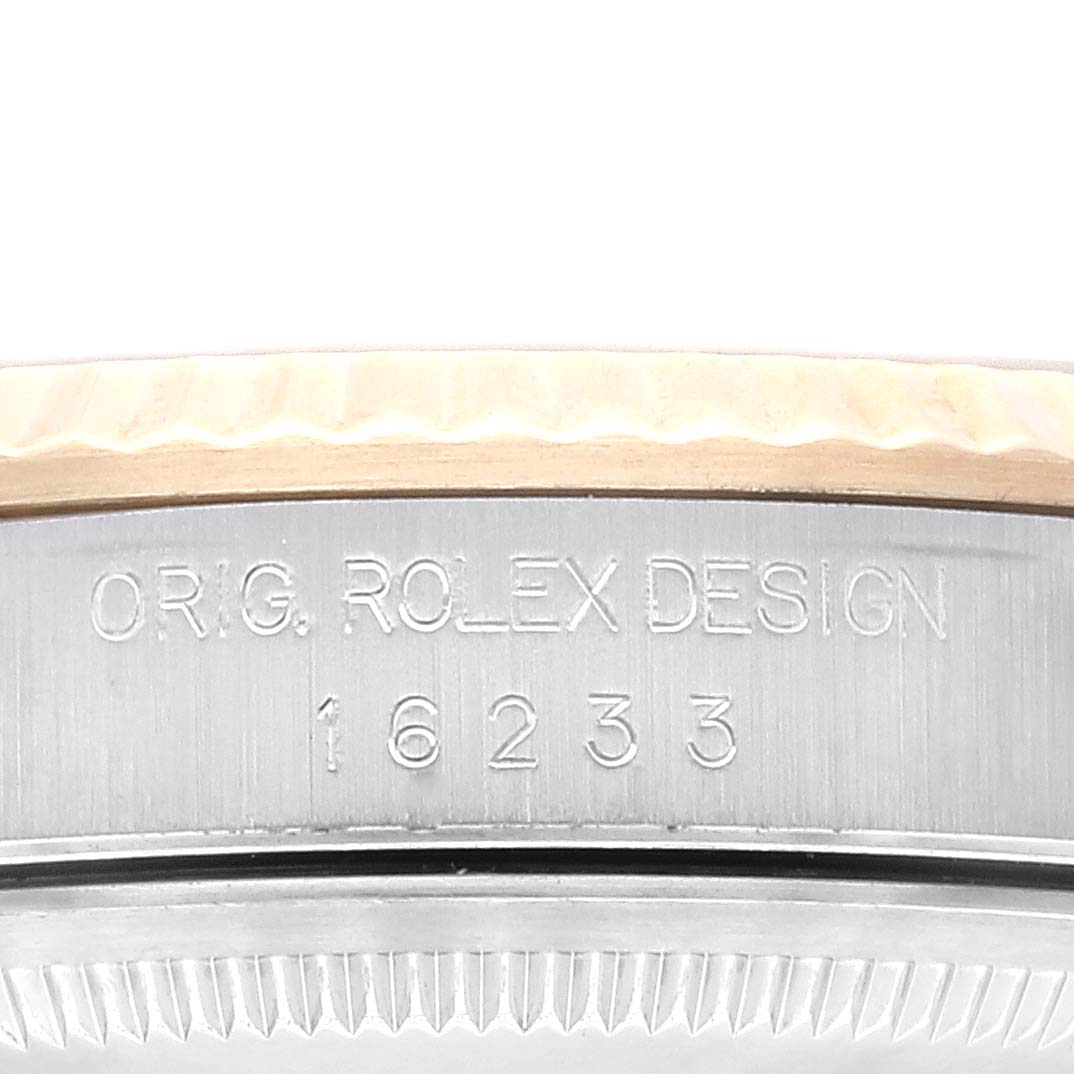 This image shows the side profile of a Rolex Datejust 16233 Men's Steel and Gold (two tone) Champagne Dial 16233 Men's Steel and Gold (two tone) Champagne Dial model, highlighting the "ORIG. ROLEX DESIGN 16233" engraving.