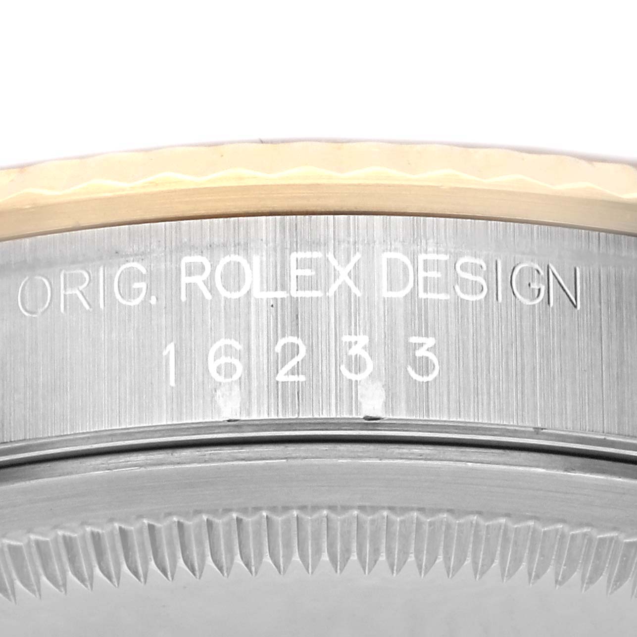 The image shows a close-up of the side case, bezel, and model number of a Rolex Datejust 16233 Men's Steel and Gold (two tone) Champagne Dial 16233 Men's Steel and Gold (two tone) Champagne Dial watch.