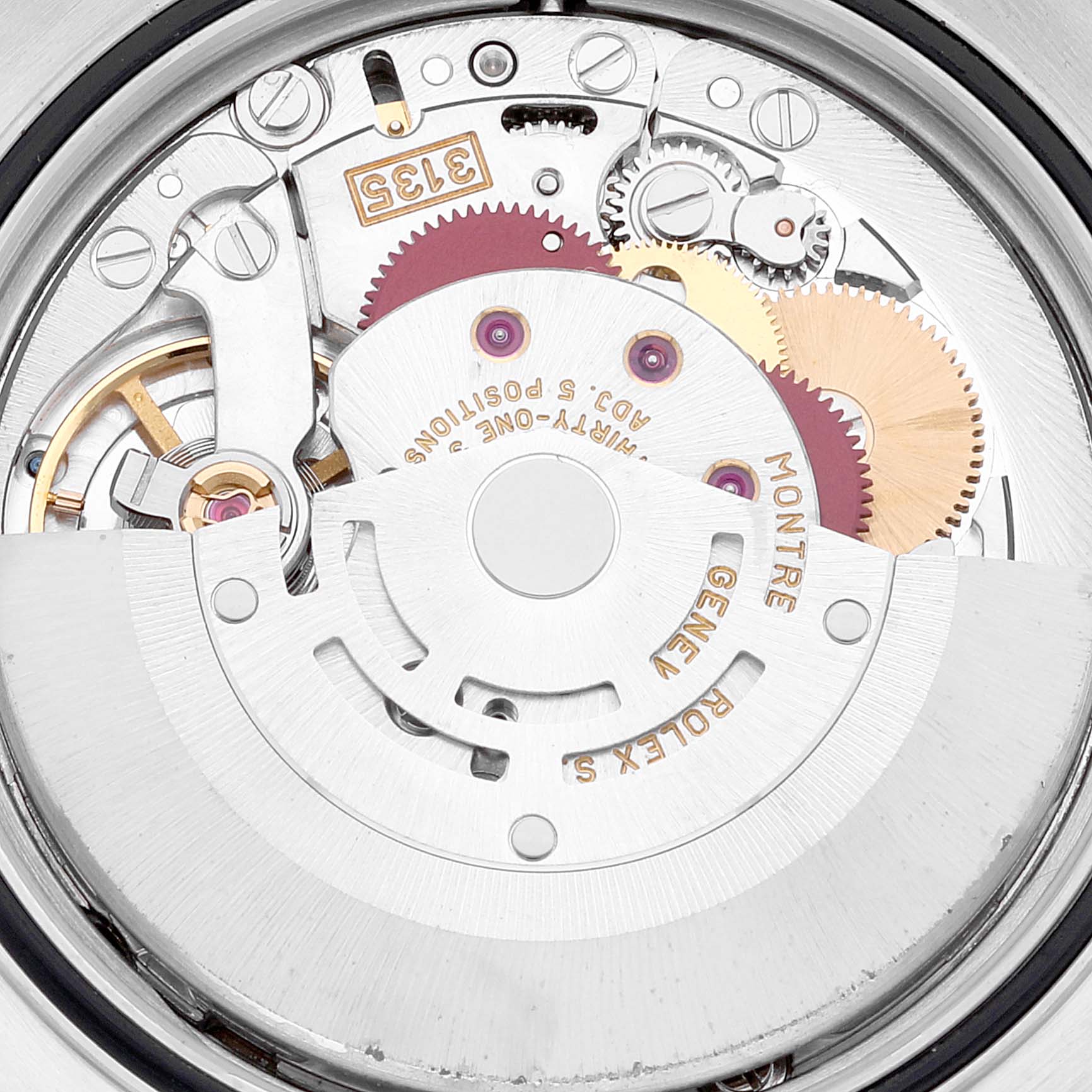 This image shows a close-up view of the Rolex Datejust 16233 Men's Steel and Gold (two tone) Silver Dial 16233 Men's Steel and Gold (two tone) Silver Dial movement mechanism, highlighting its intricate gears and components.