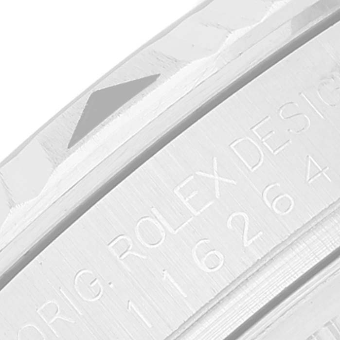 The image shows a close-up of the bezel and engraved case side of a Rolex Turn-o-Graph 116264 Men's Stainless Steel Black Dial 116264 Men's Stainless Steel Black Dial watch.