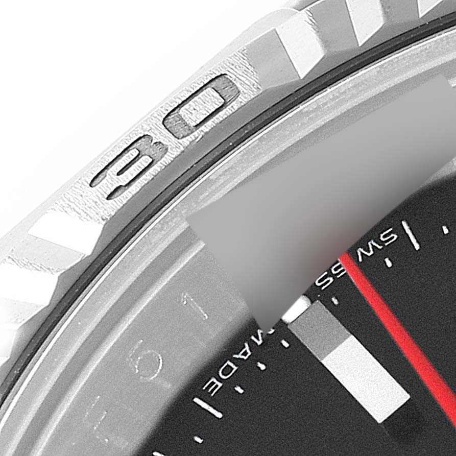 This close-up image shows the bezel and part of the dial of a Rolex Turn-o-Graph 116264 Men's Stainless Steel Black Dial 116264 Men's Stainless Steel Black Dial watch.