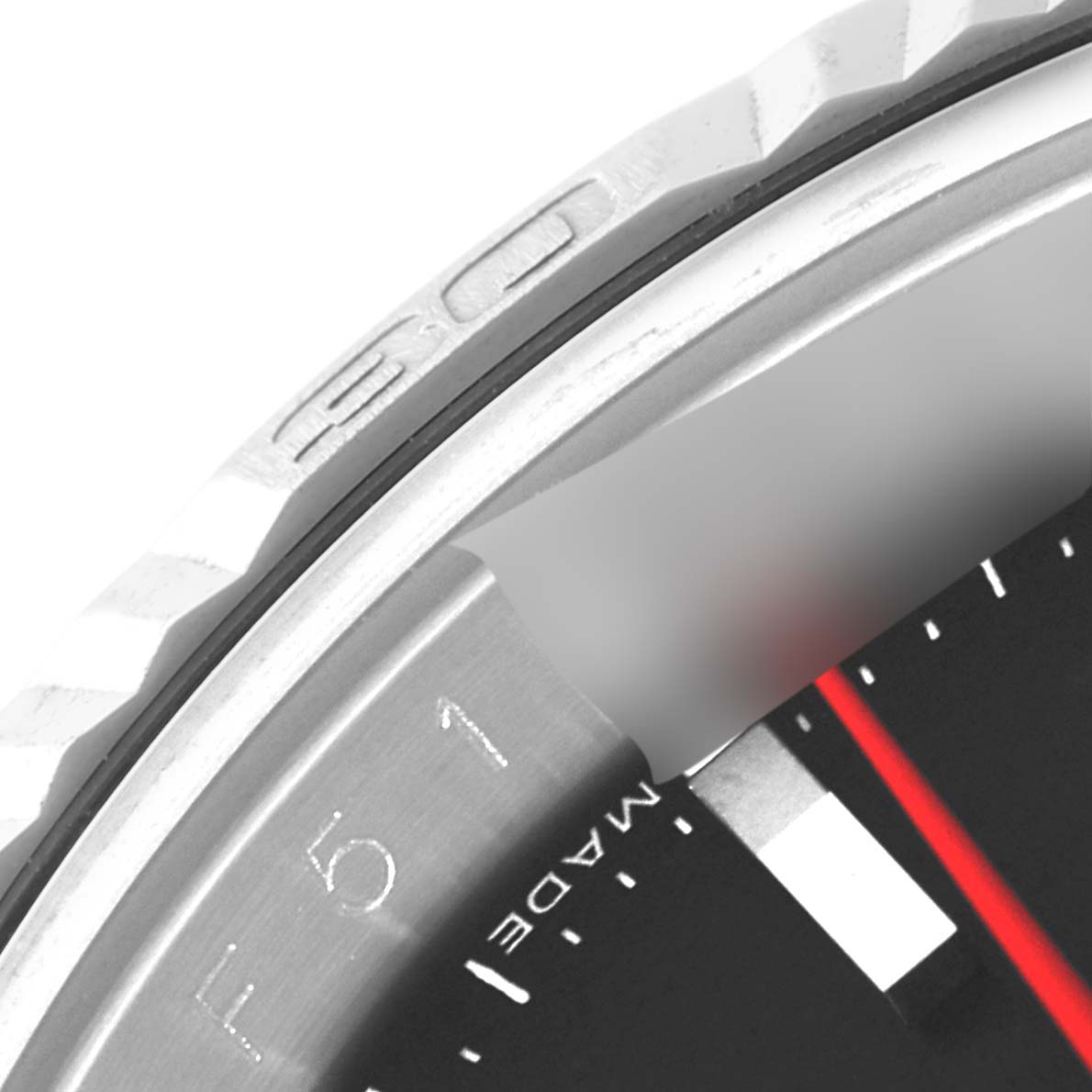 This is a close-up angle of the bezel and part of the dial of a Rolex Turn-o-Graph 116264 Men's Stainless Steel Black Dial 116264 Men's Stainless Steel Black Dial watch.