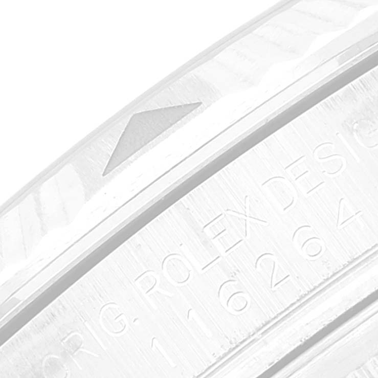 The image shows a close-up of the bezel and engraved serial details of a Rolex Turn-o-Graph 116264 Men's Stainless Steel Black Dial 116264 Men's Stainless Steel Black Dial watch.