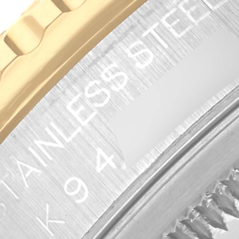 The image shows a close-up of the bezel and edge of the Rolex Turn-o-Graph 16263 Men's Steel and Gold (two tone) White Dial 16263 Men's Steel and Gold (two tone) White Dial, highlighting the gold and stainless steel parts.