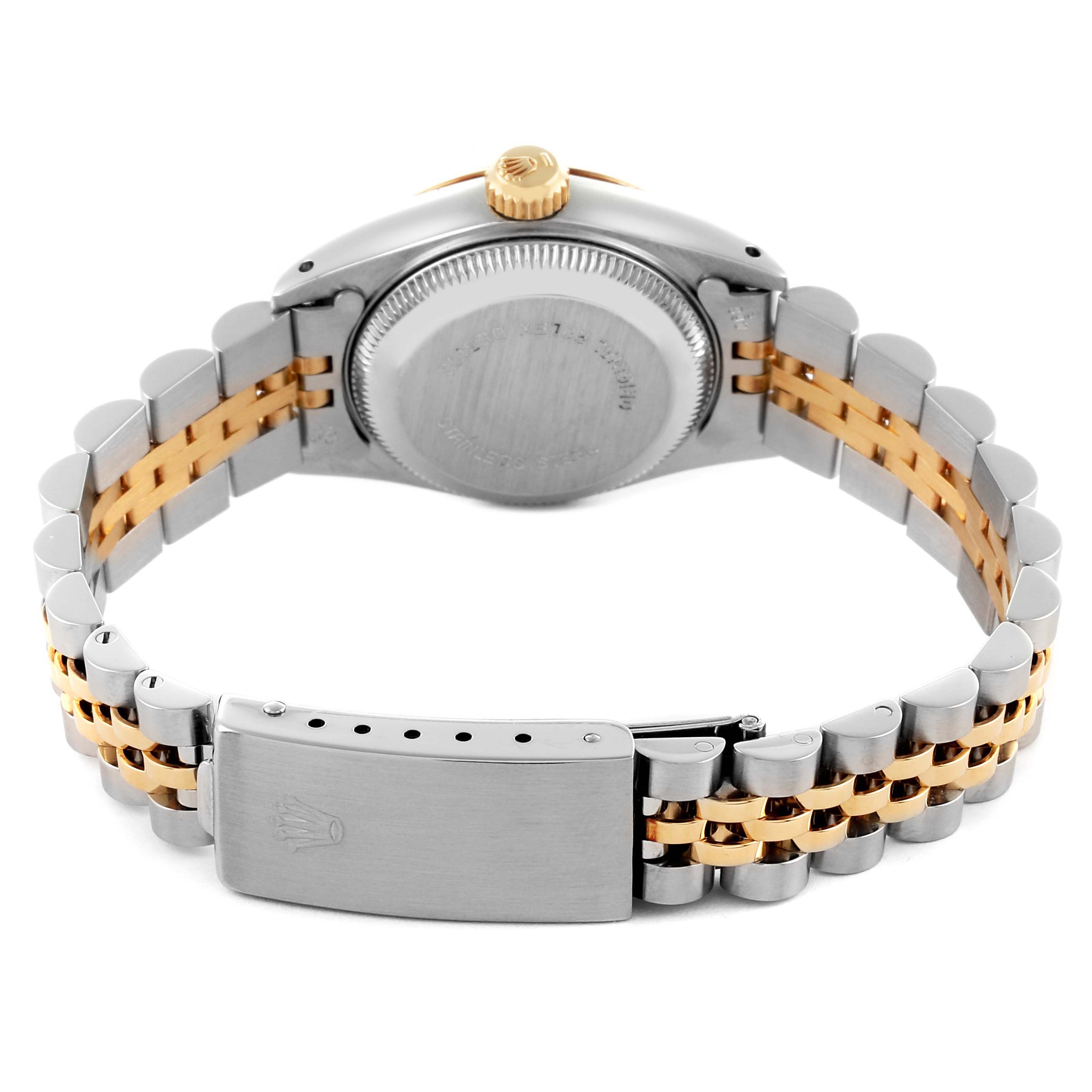 The image shows the back of the Rolex Date 69173 Women
s Steel and Gold (two tone) White Dial 69173 Women
s Steel and Gold (two tone) White Dial watch, featuring its clasp, bracelet, and case back in a two-tone design.