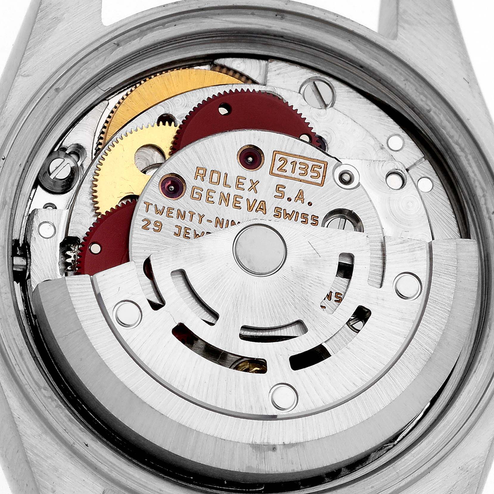 The image shows the movement mechanism of a Rolex Date 69173 Women
s Steel and Gold (two tone) White Dial 69173 Women
s Steel and Gold (two tone) White Dial watch from a top-down angle, highlighting the gears and rotor.