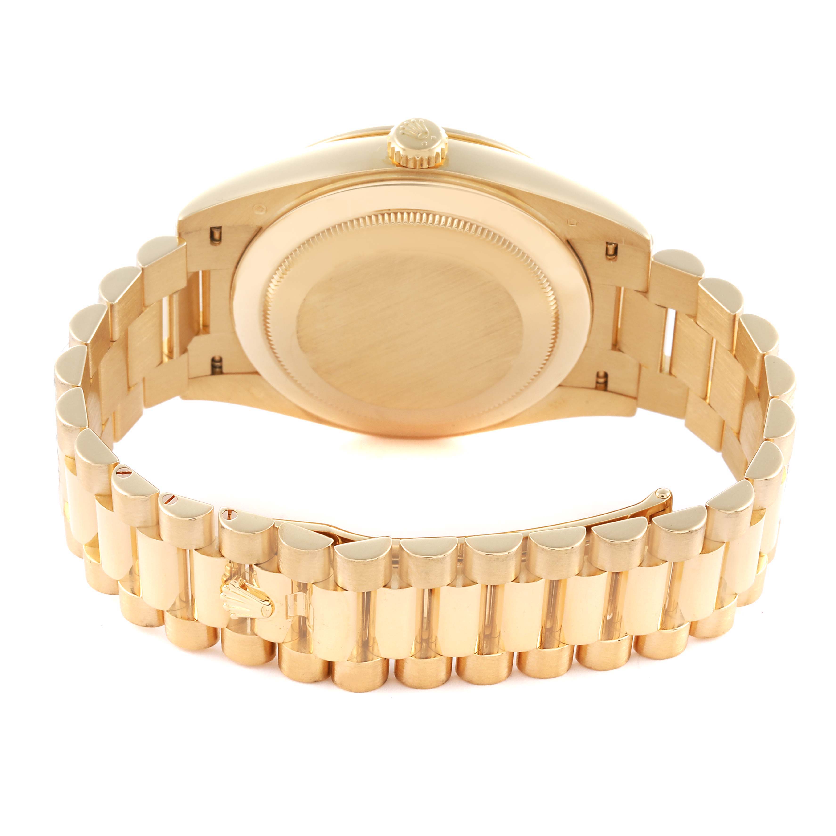 The Rolex President 228348 Men's Yellow Gold Champagne Dial 228348 Men's Yellow Gold Champagne Dial model is shown from the back, highlighting the bracelet and case back.