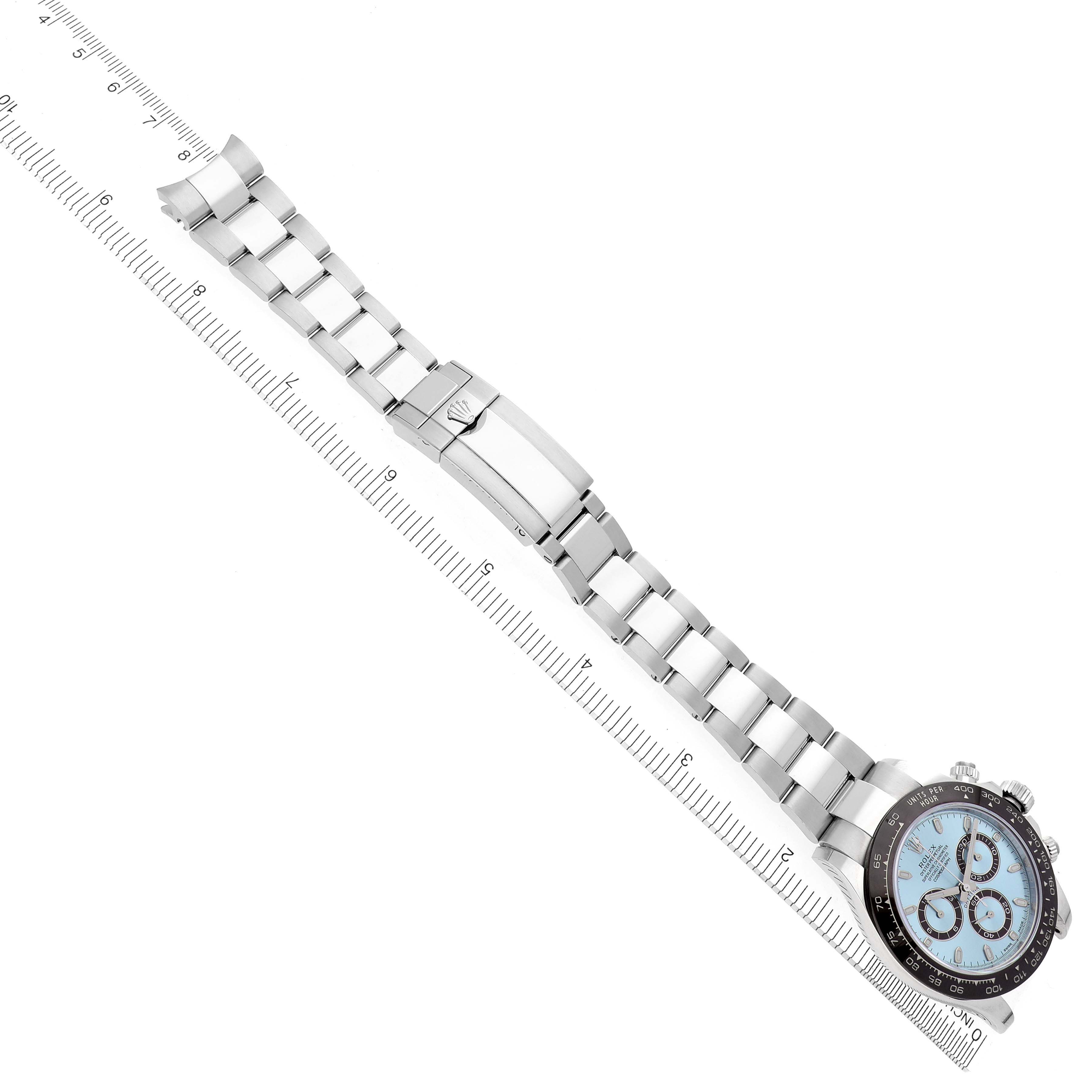 The Rolex Daytona 116506 Men's Platinum Blue Dial 116506 Men's Platinum Blue Dial is shown from an overhead angle, displaying the full bracelet and face.