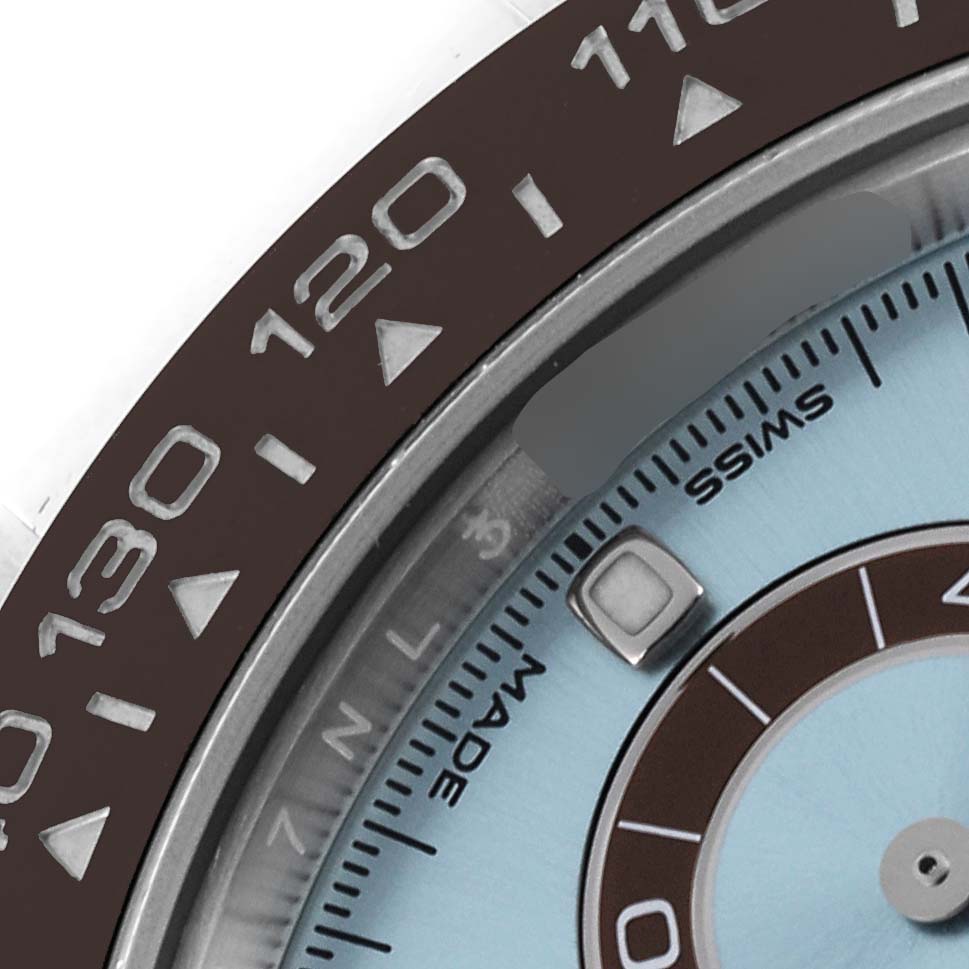 The image shows a close-up of the bezel and dial edge of a Rolex Daytona 116506 Men's Platinum Blue Dial 116506 Men's Platinum Blue Dial watch.